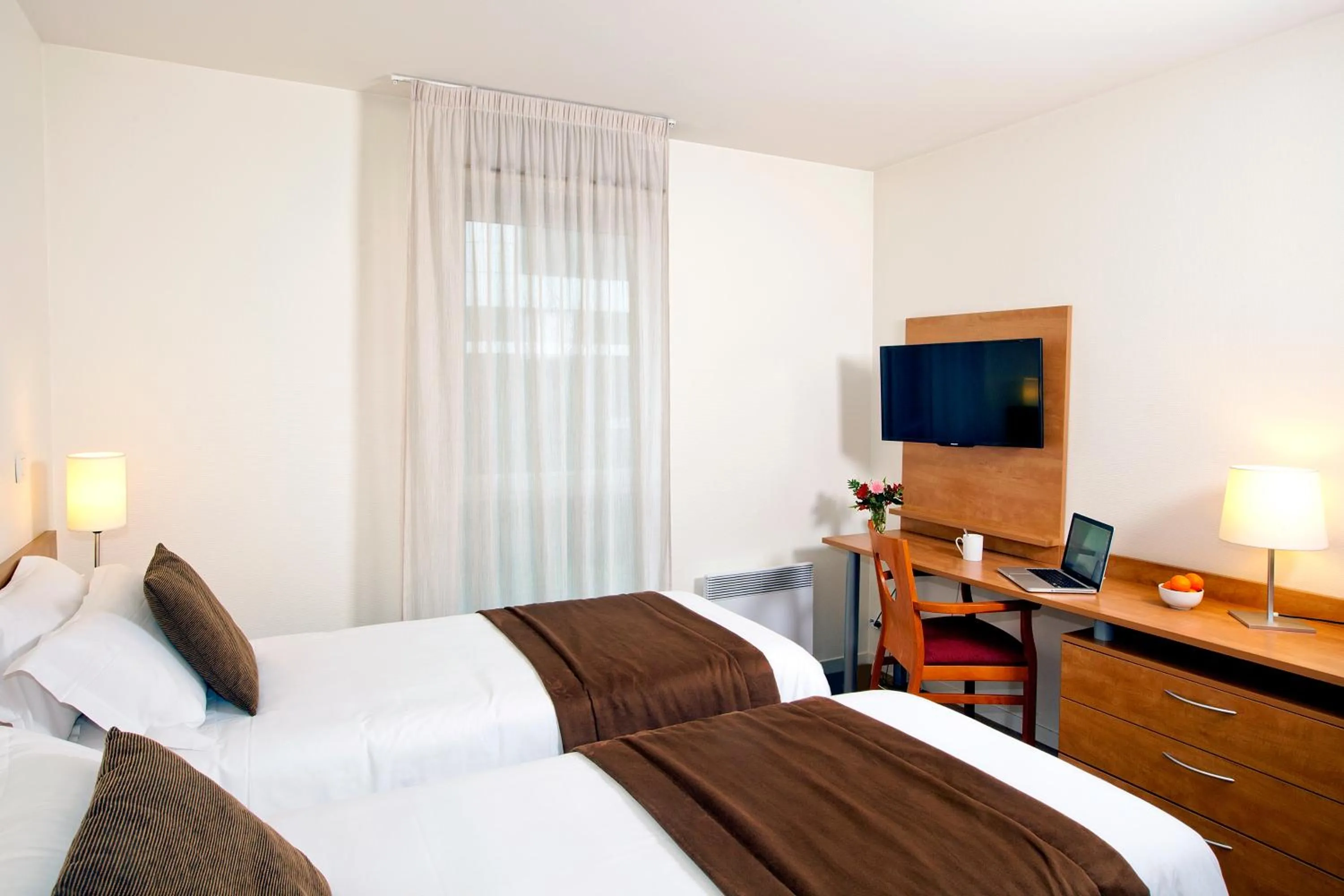 Bedroom, Bed in Séjours & Affaires Rennes Longs Champs