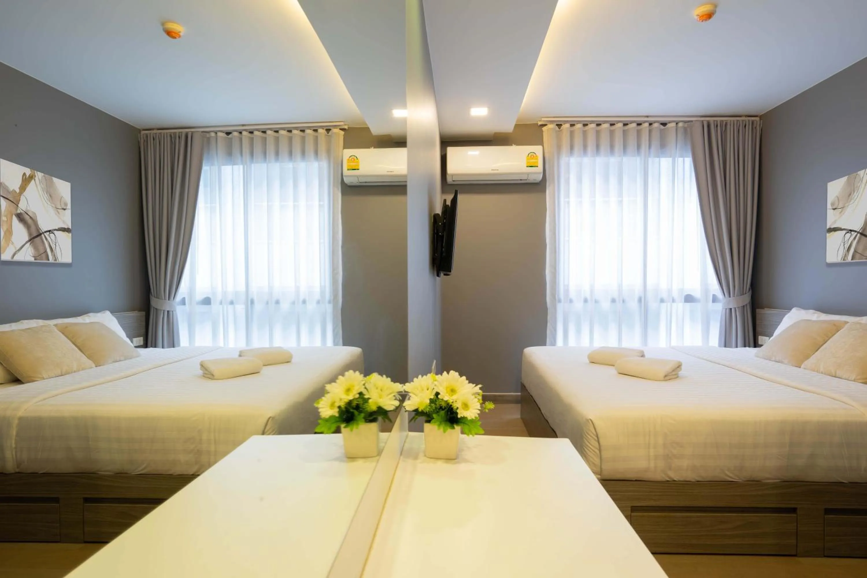 Bed in Dazzle Residence