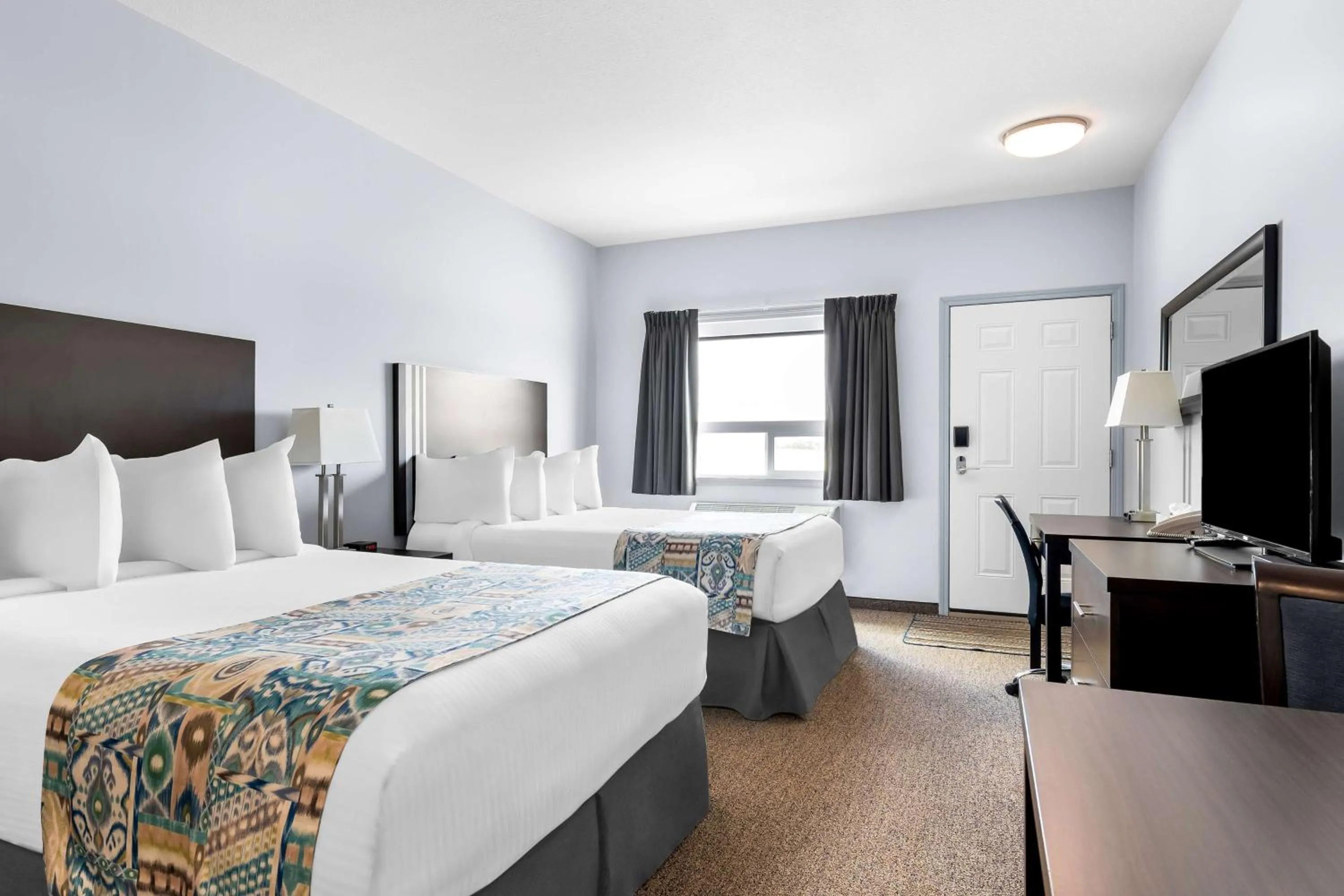 Bedroom, Bed in SureStay Studio by Best Western Hardisty