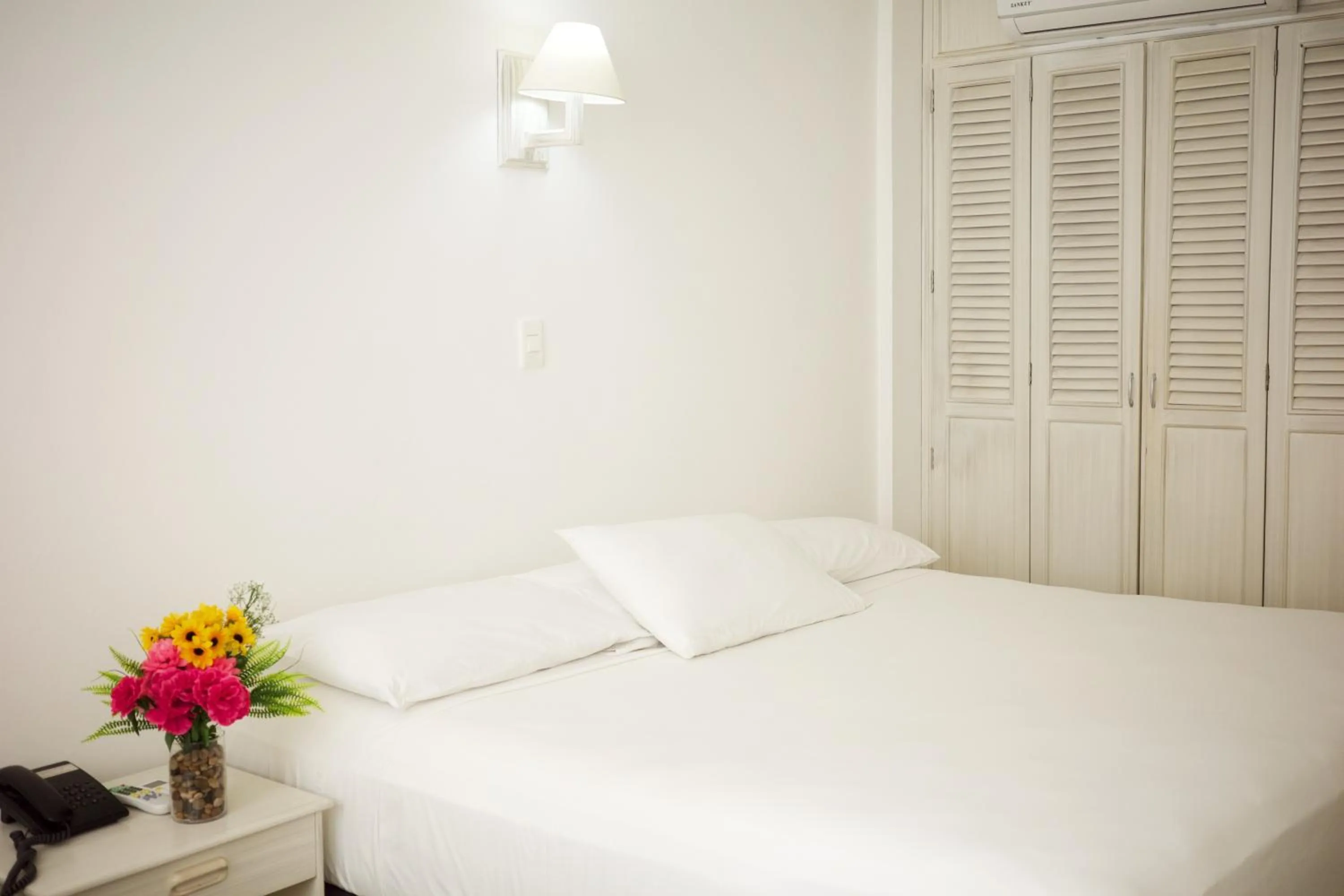 Bed in Hotel La Riviera