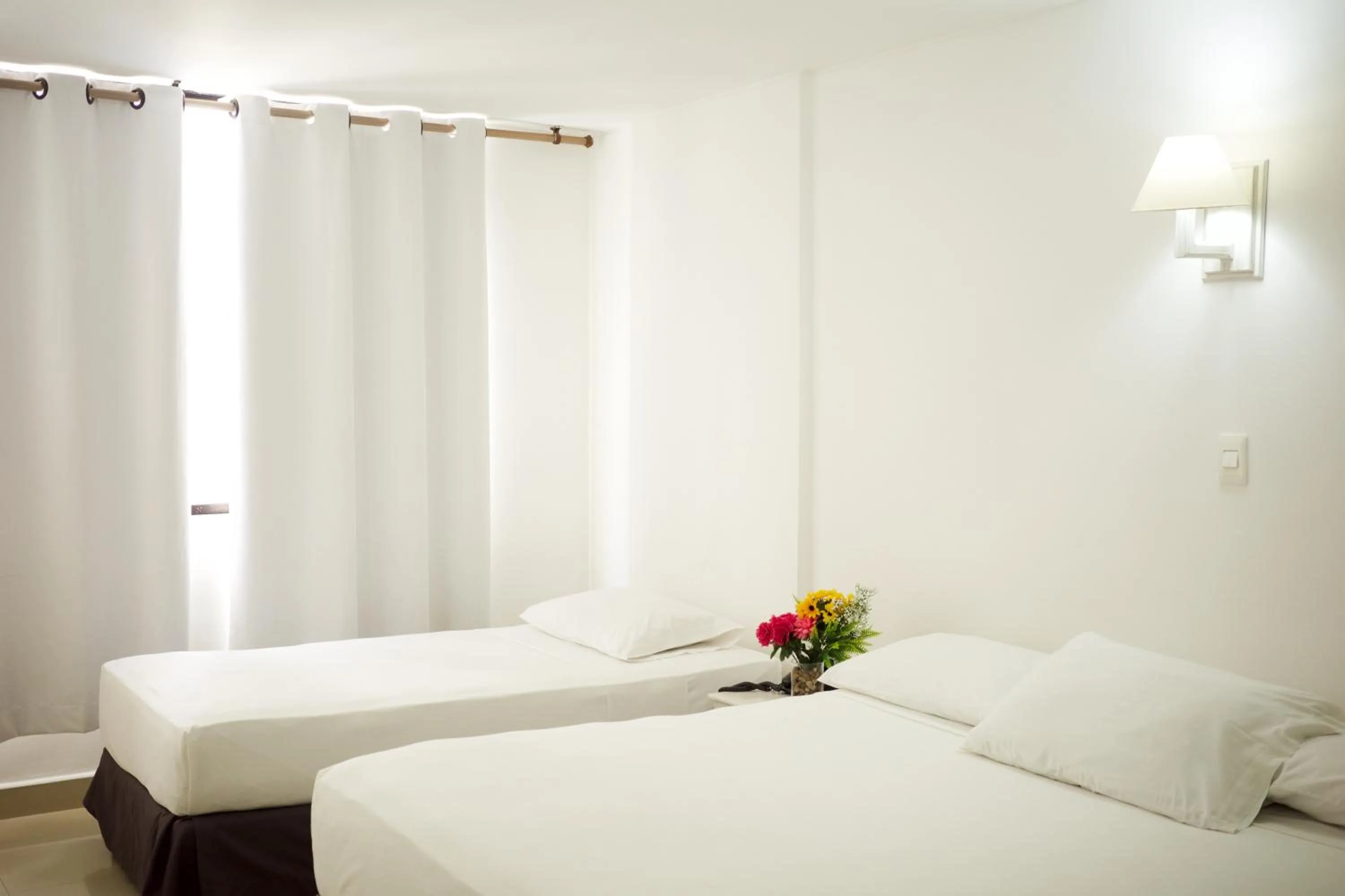 Bed in Hotel La Riviera