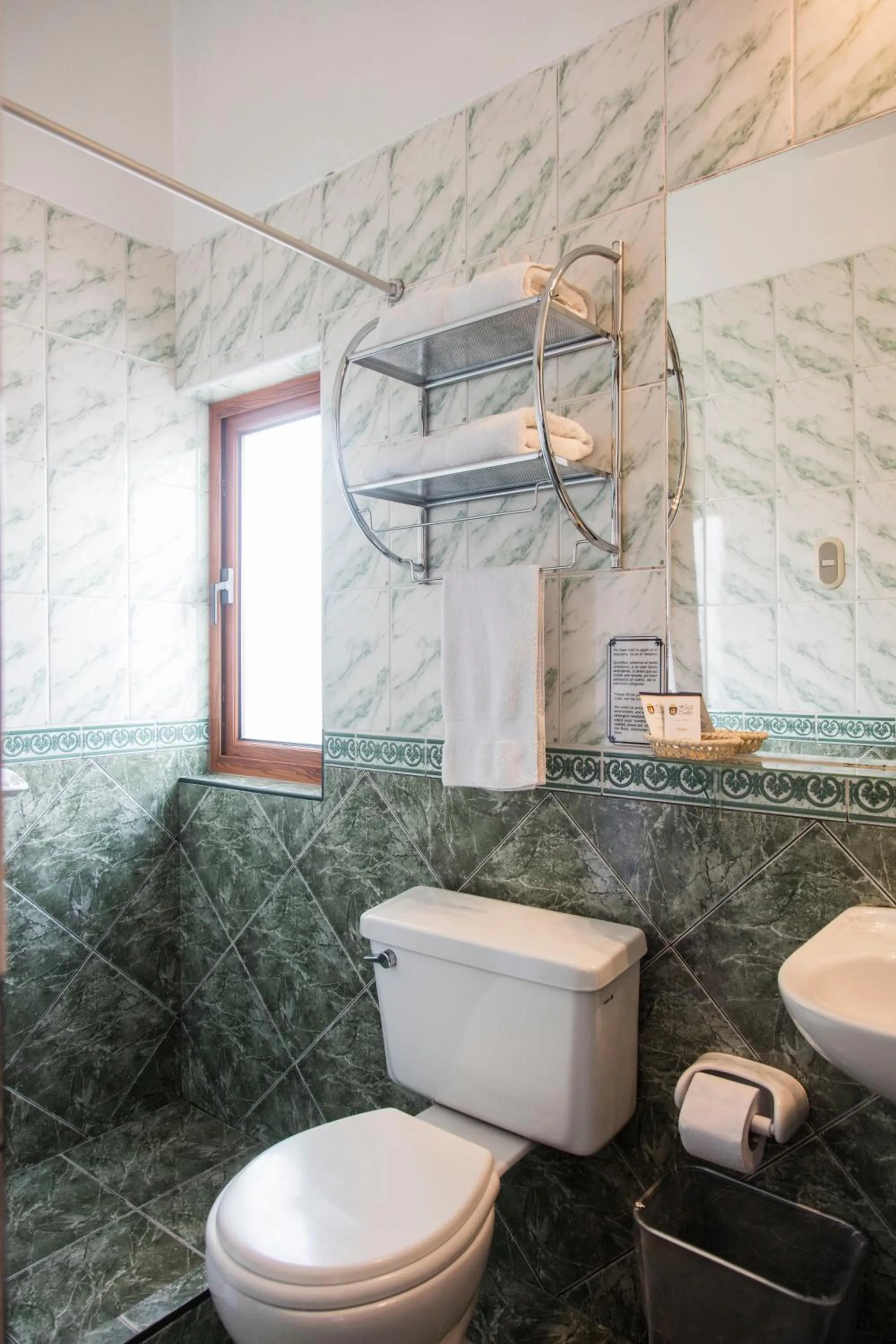 Bathroom in Hostal & Apartments El Triunfo