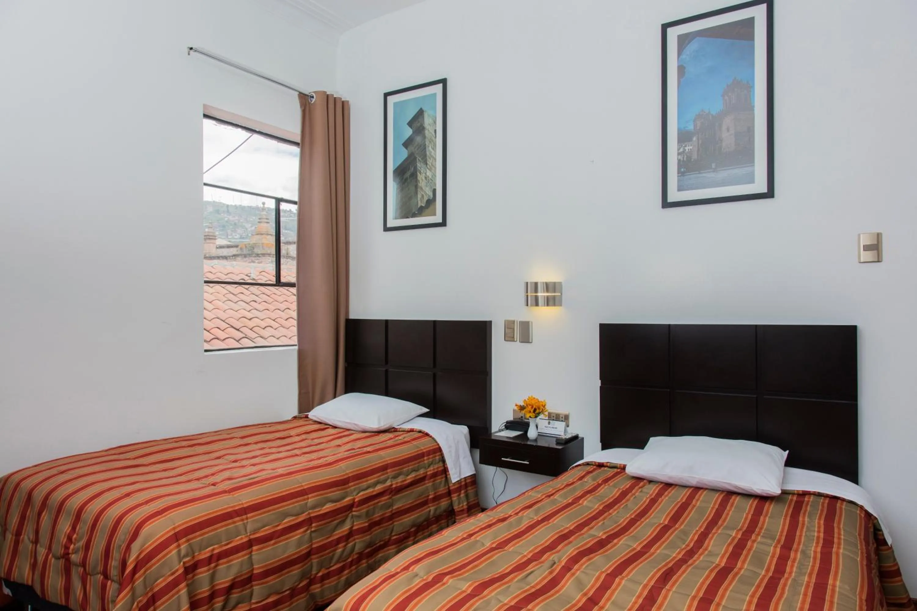 Photo of the whole room, Bed in Hostal & Apartments El Triunfo