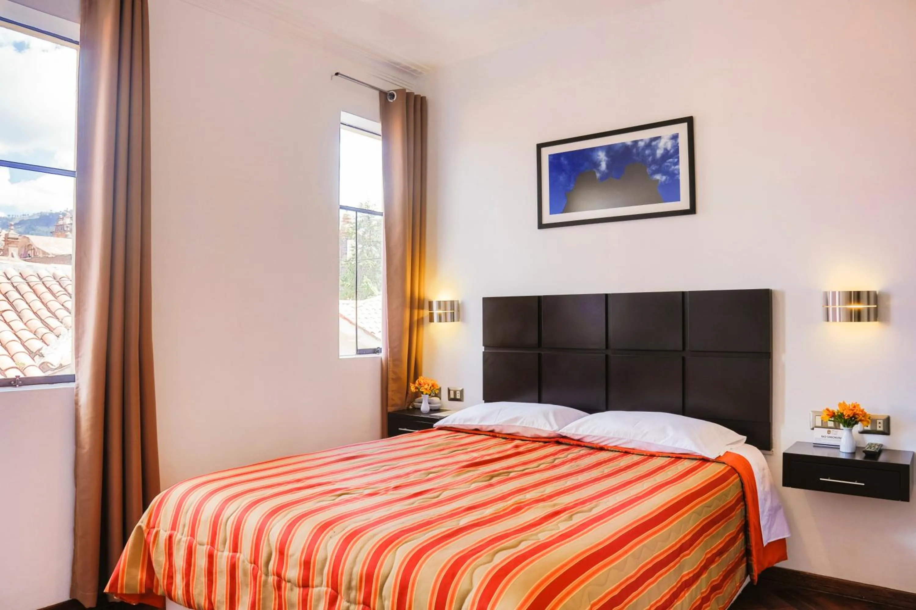 Photo of the whole room, Bed in Hostal & Apartments El Triunfo