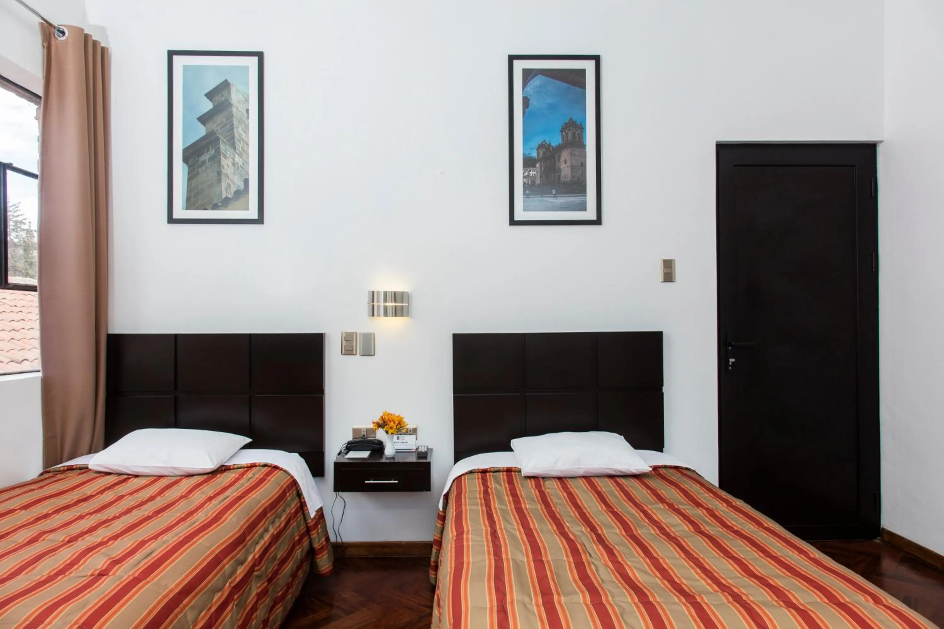 Photo of the whole room, Bed in Hostal & Apartments El Triunfo