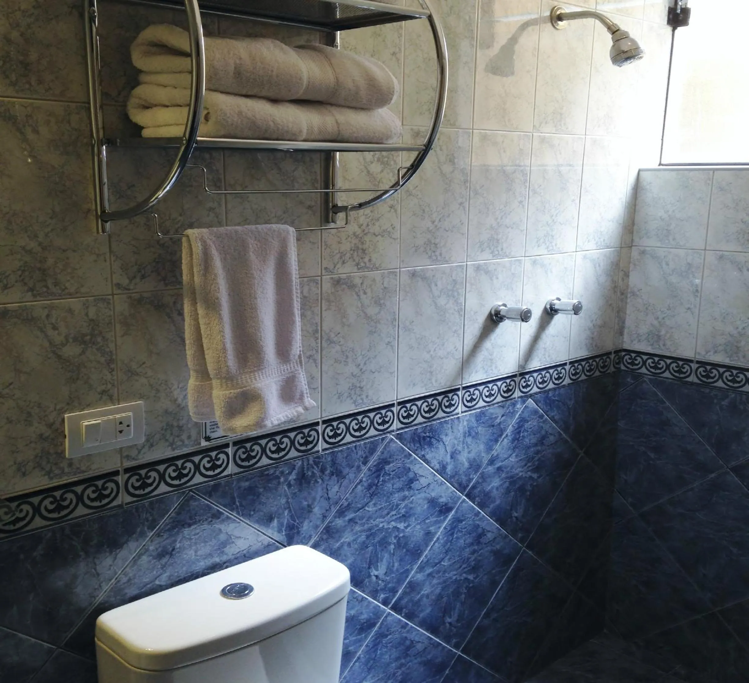 Bathroom in Hostal & Apartments El Triunfo