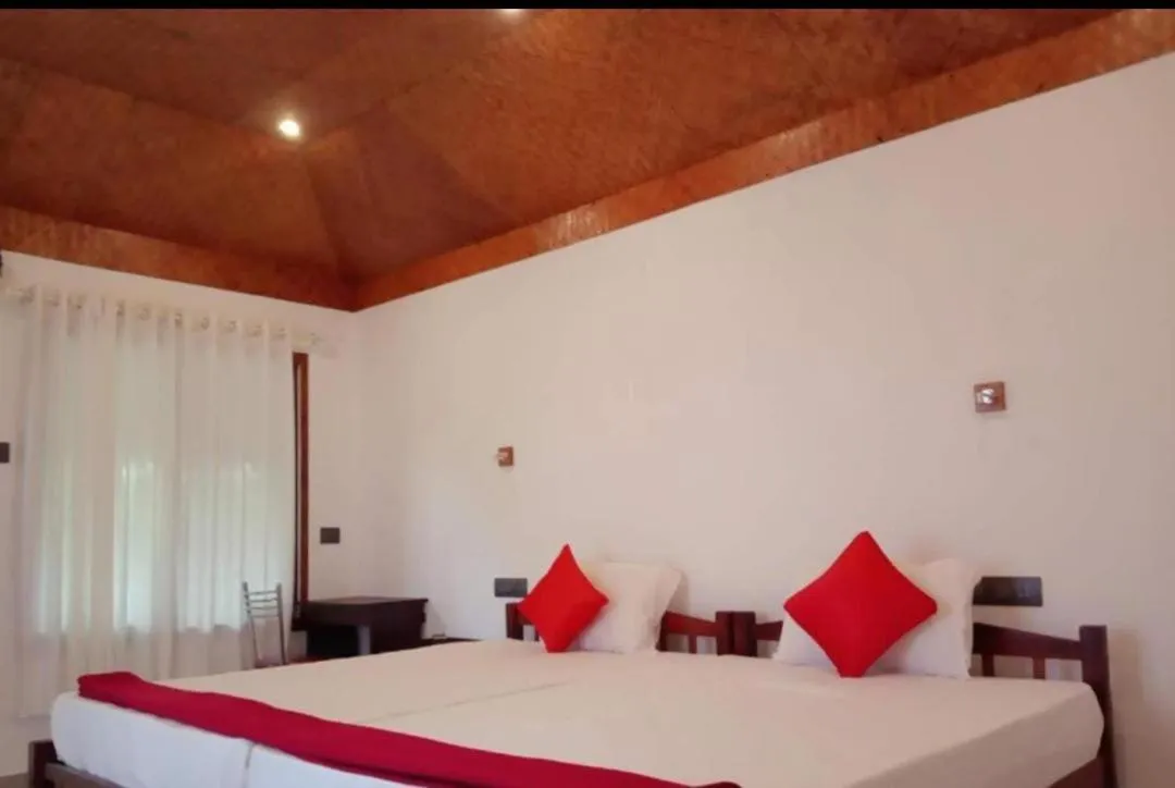 Bed in Lakefront Beach Homes