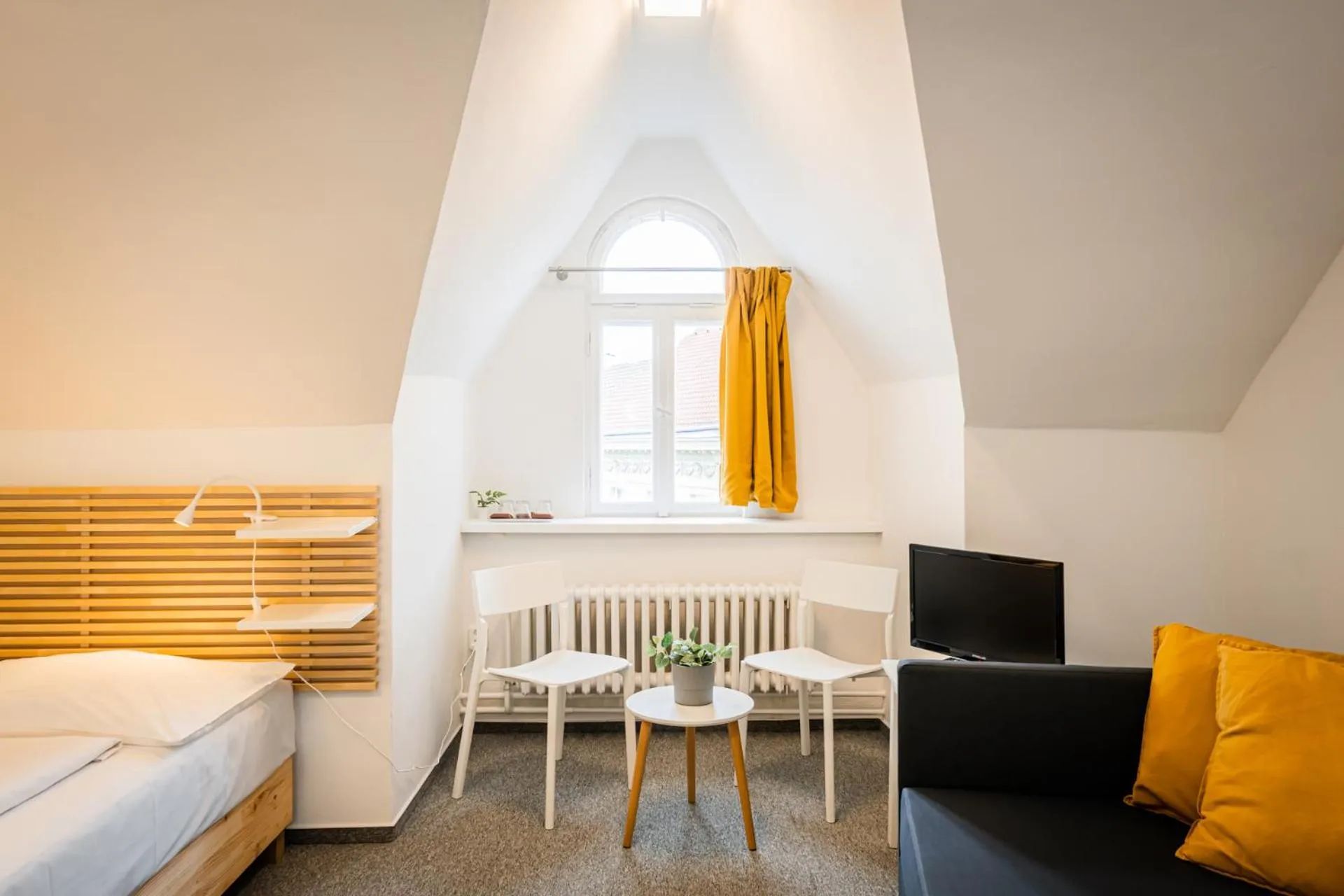 Seating area, Bed in Self-service Hotel Ostaš Praha