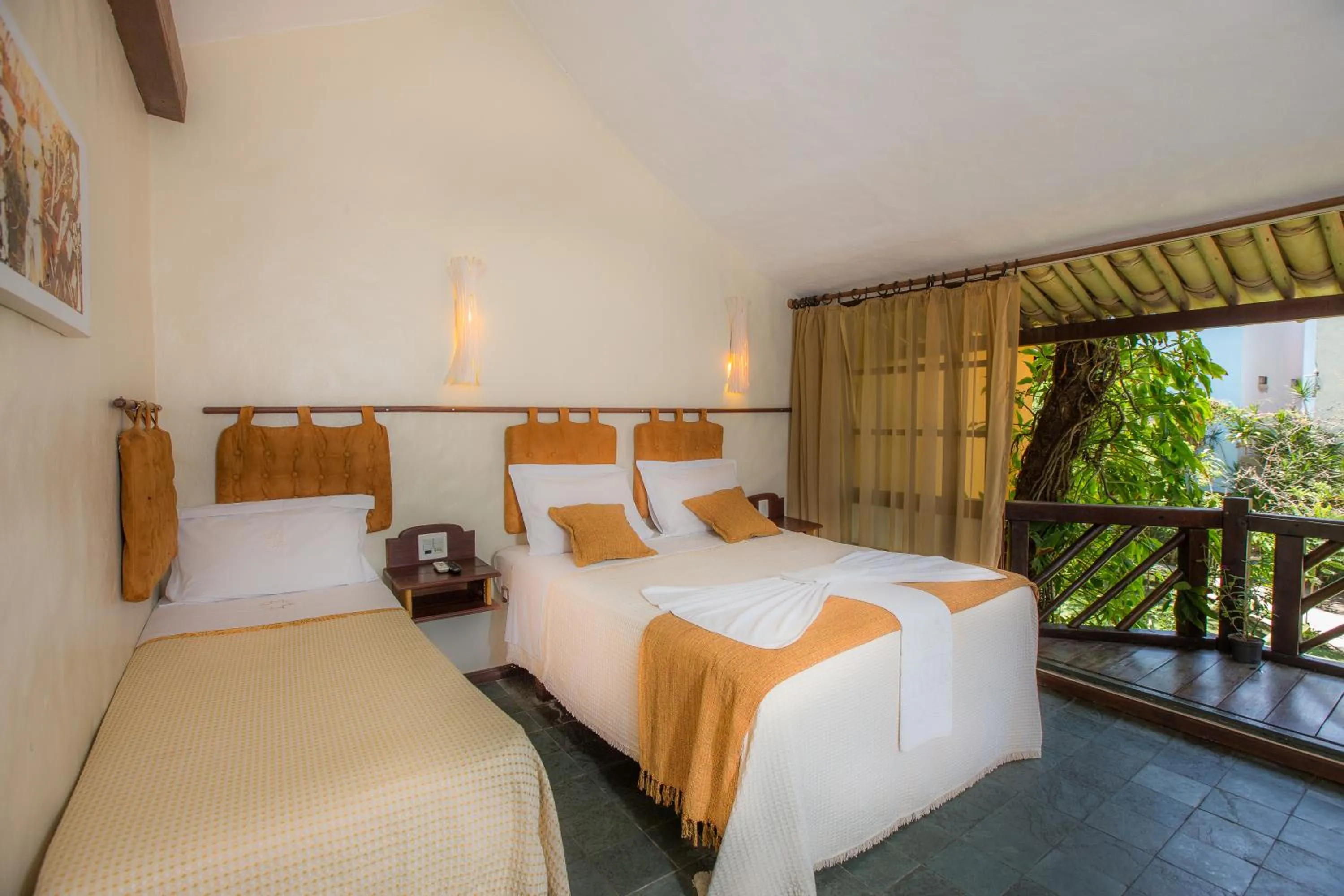 Bed in Pousada Dos Artistas