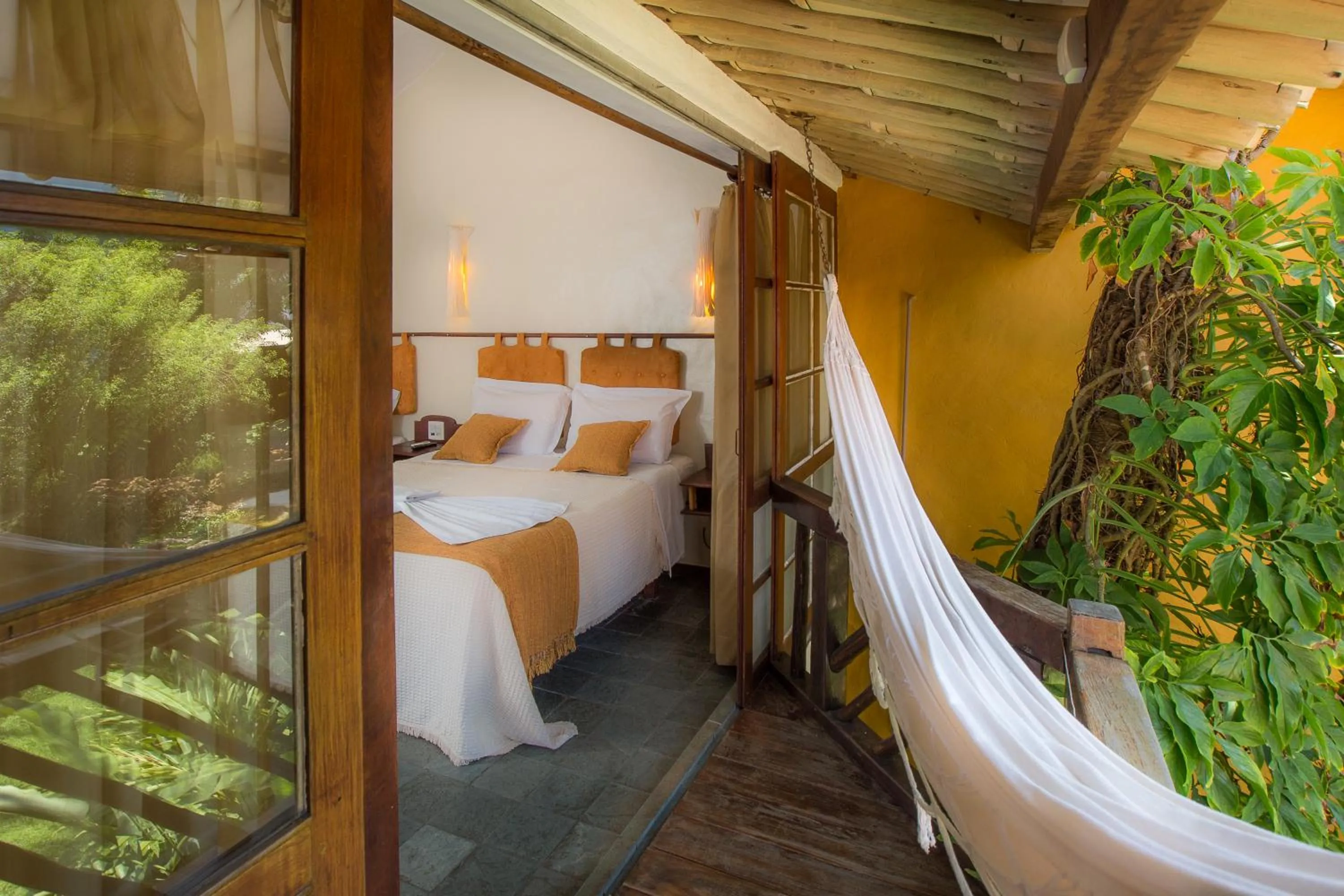 Bed in Pousada Dos Artistas