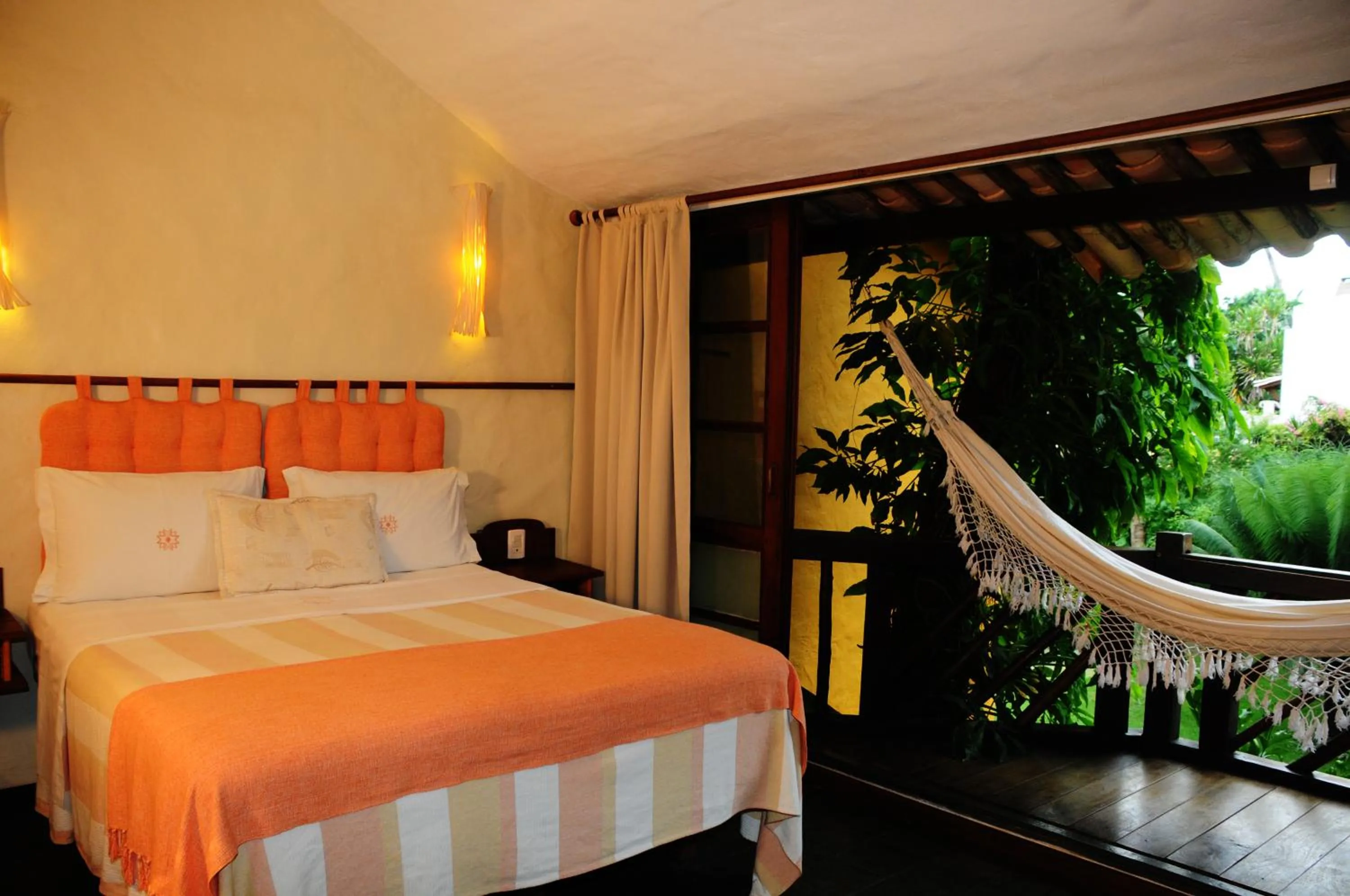 Bed in Pousada Dos Artistas