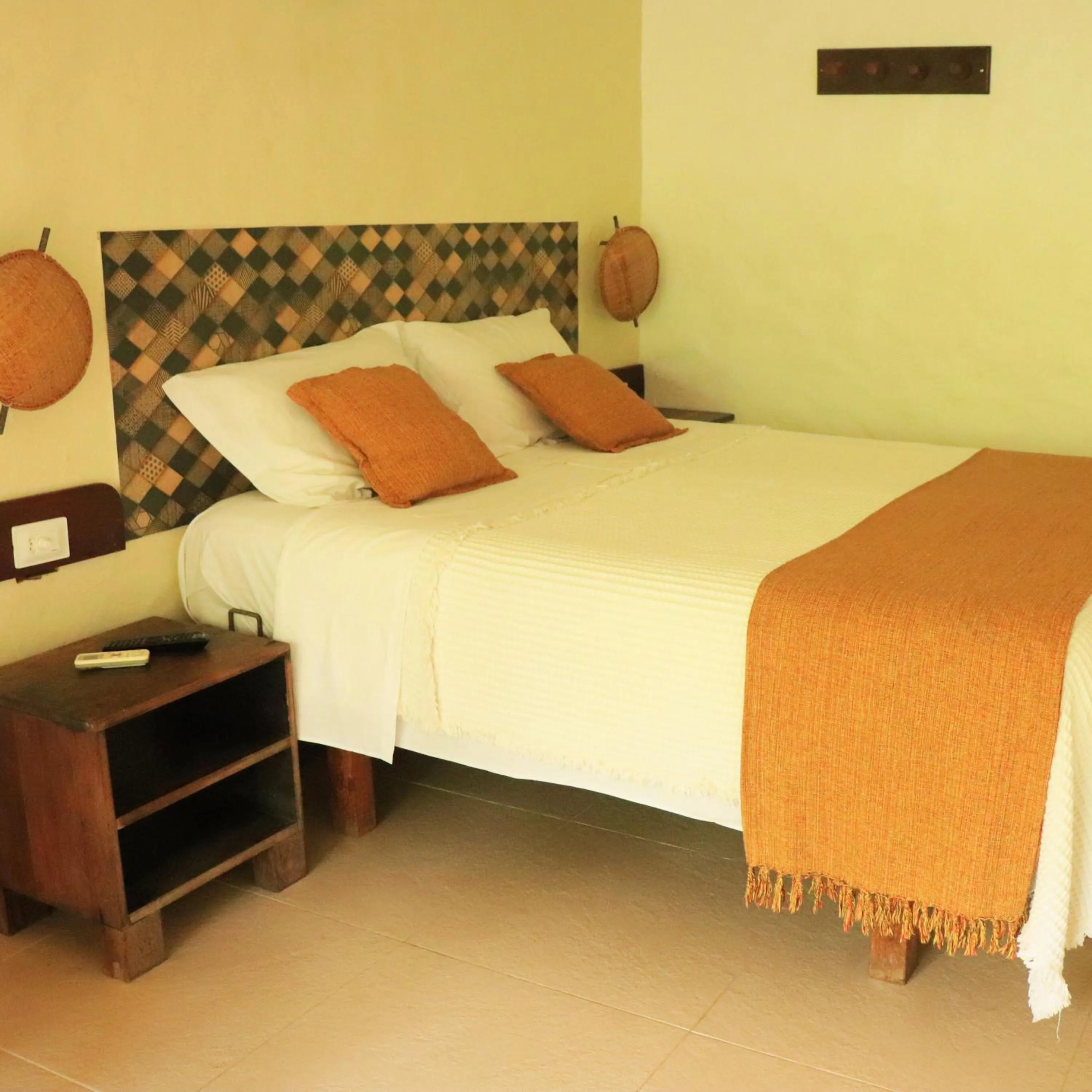 Bed in Pousada Dos Artistas