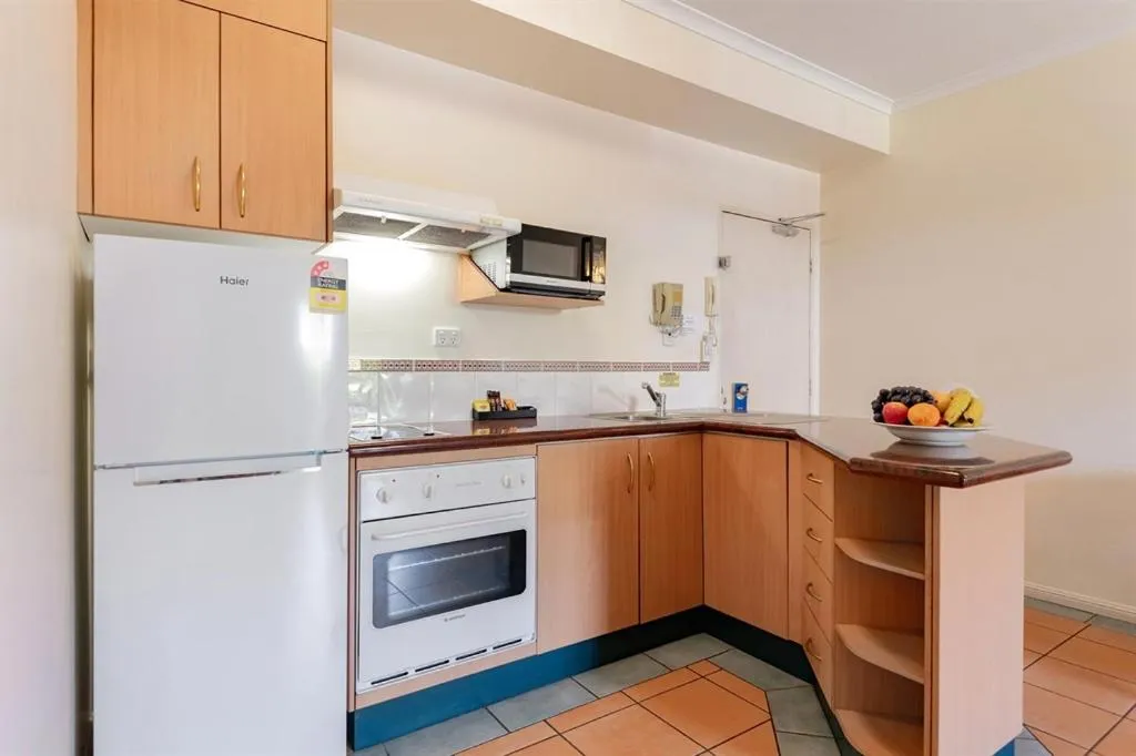 Kitchen or kitchenette in Mid City Luxury Suites