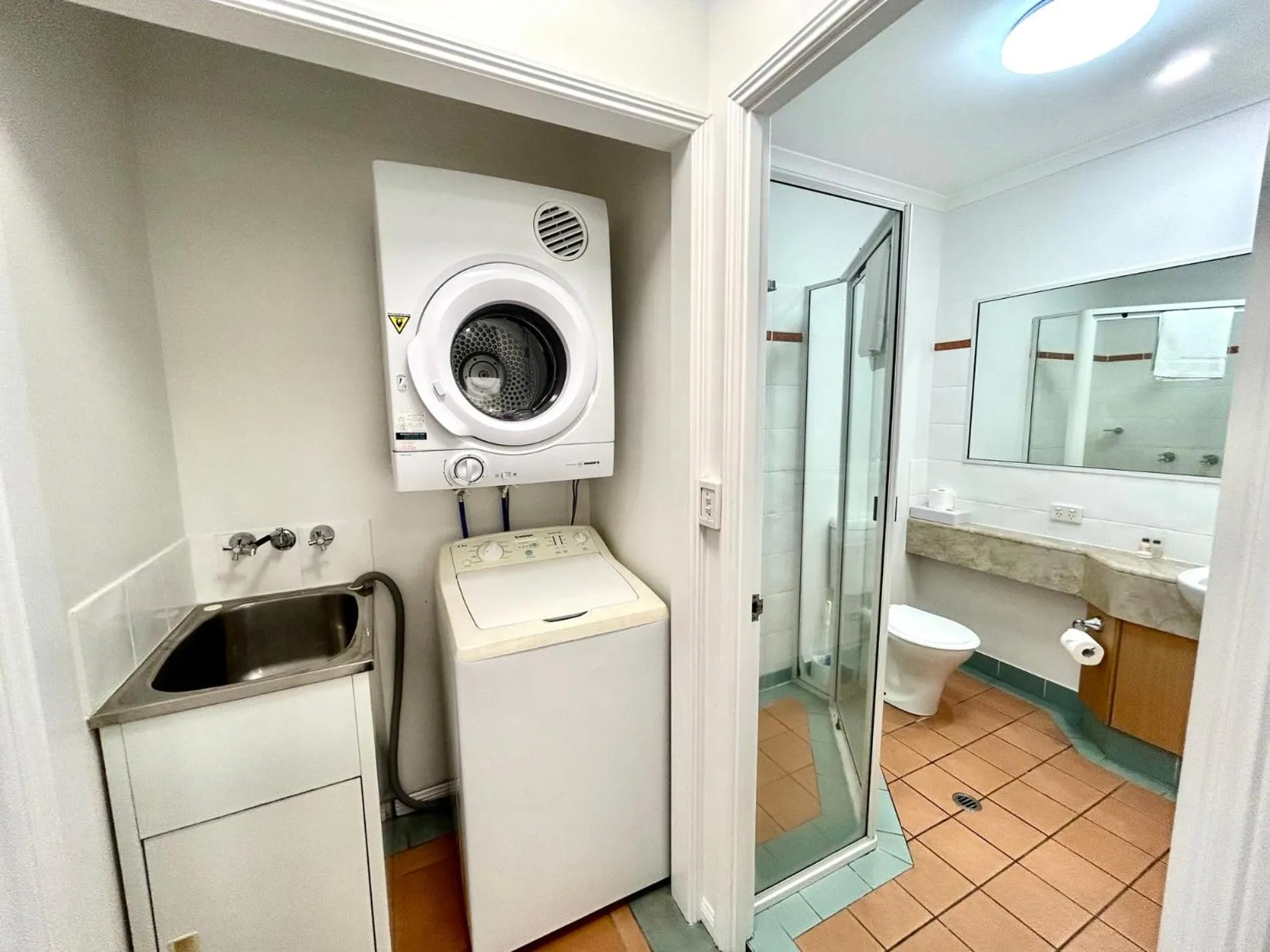 laundry in Mid City Luxury Suites