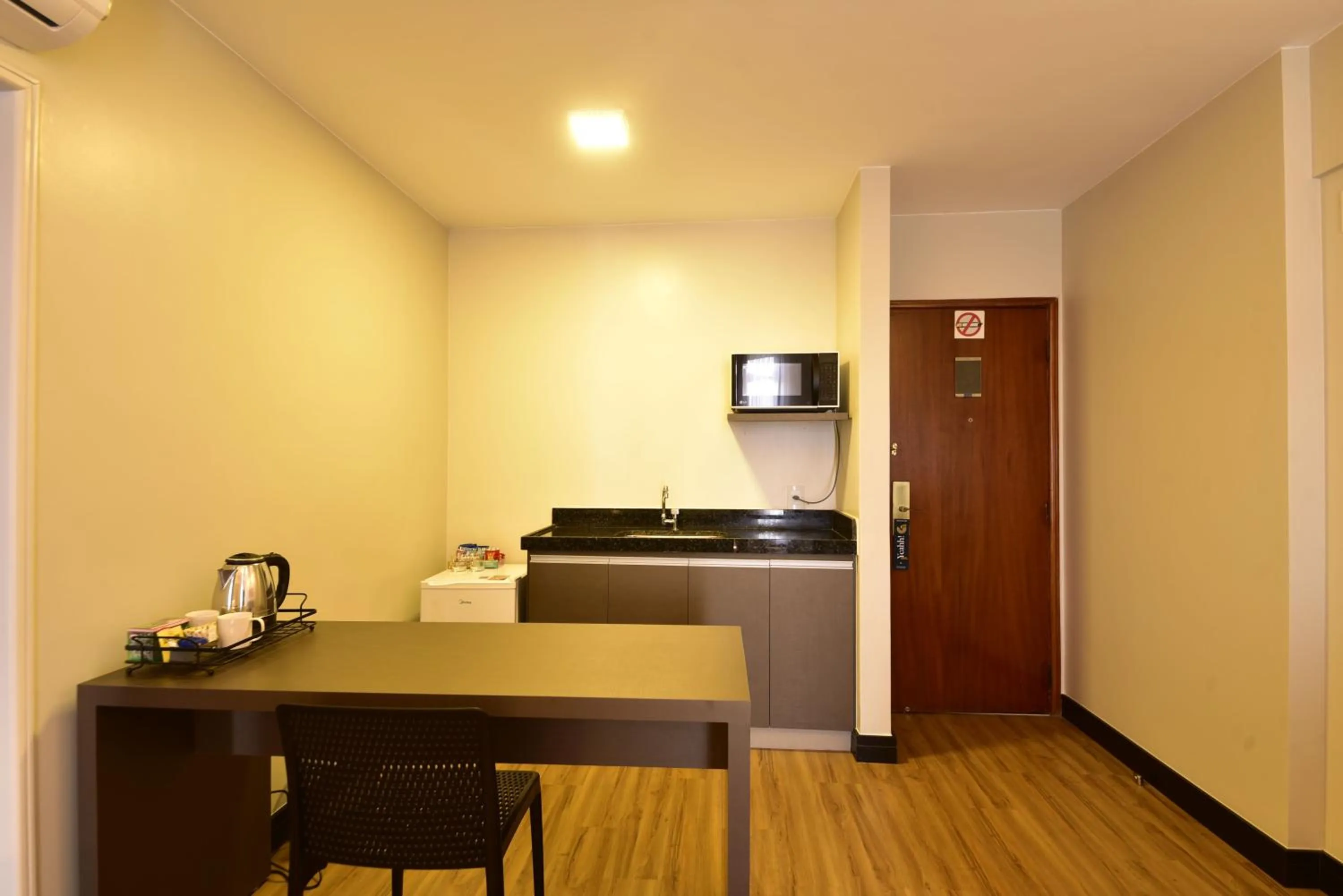 Kitchen or kitchenette in Golden Tulip Goiania Address