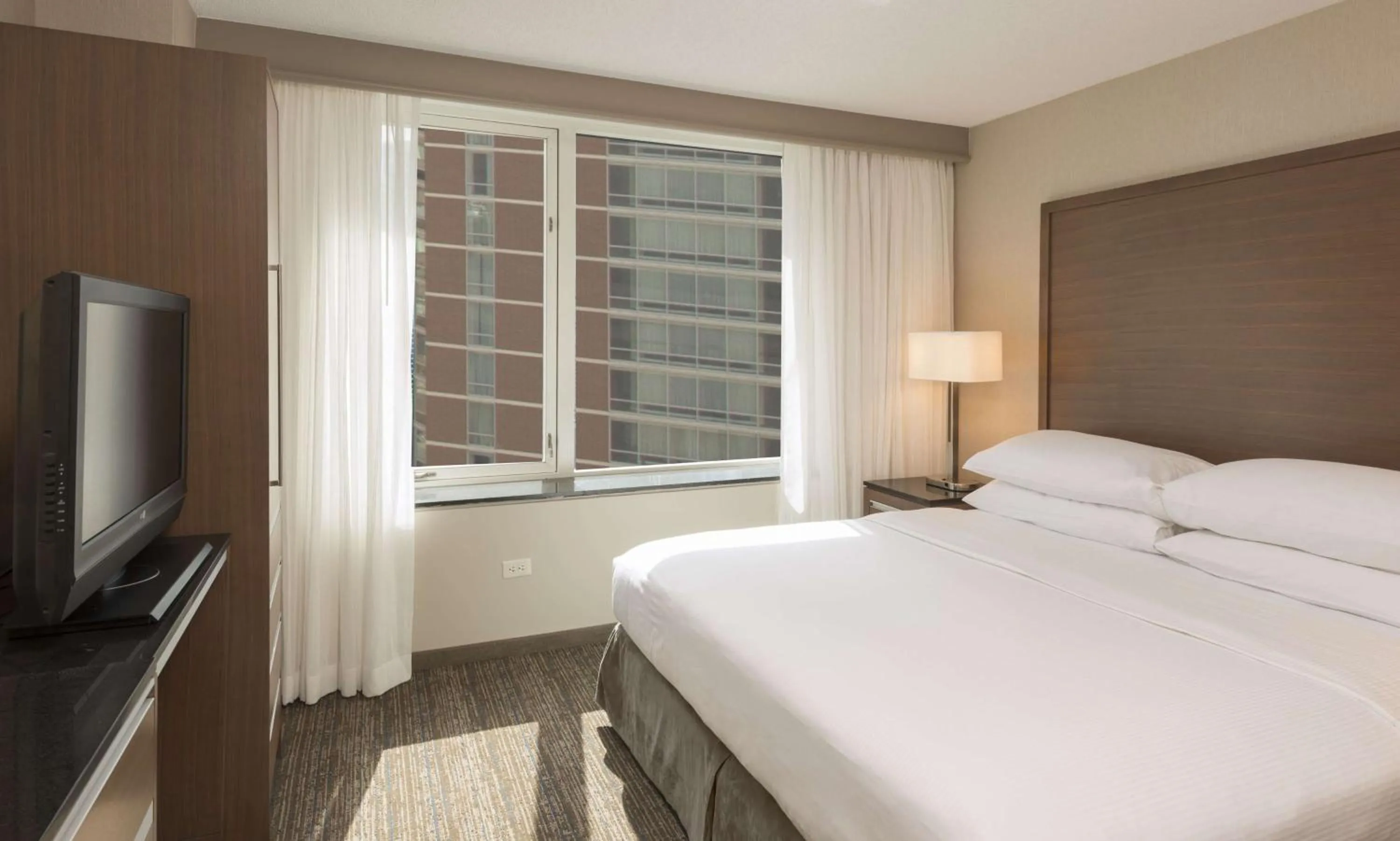 Bed in Embassy Suites by Hilton Chicago Downtown Magnificent Mile