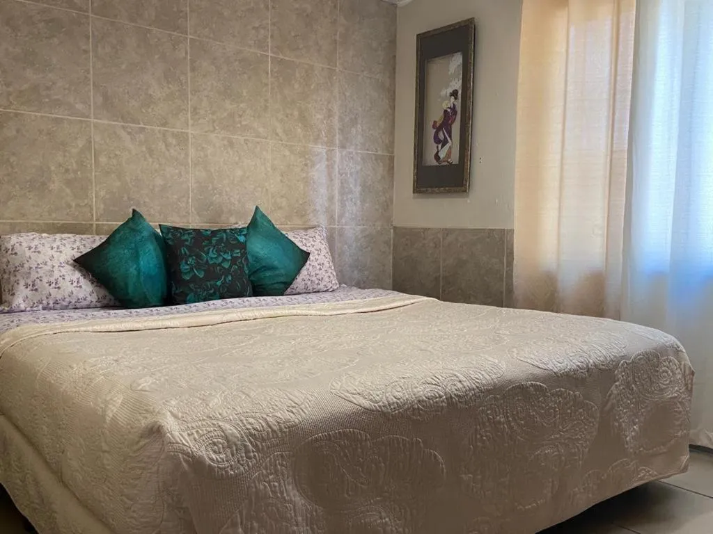 Bed in Departamento Bahia