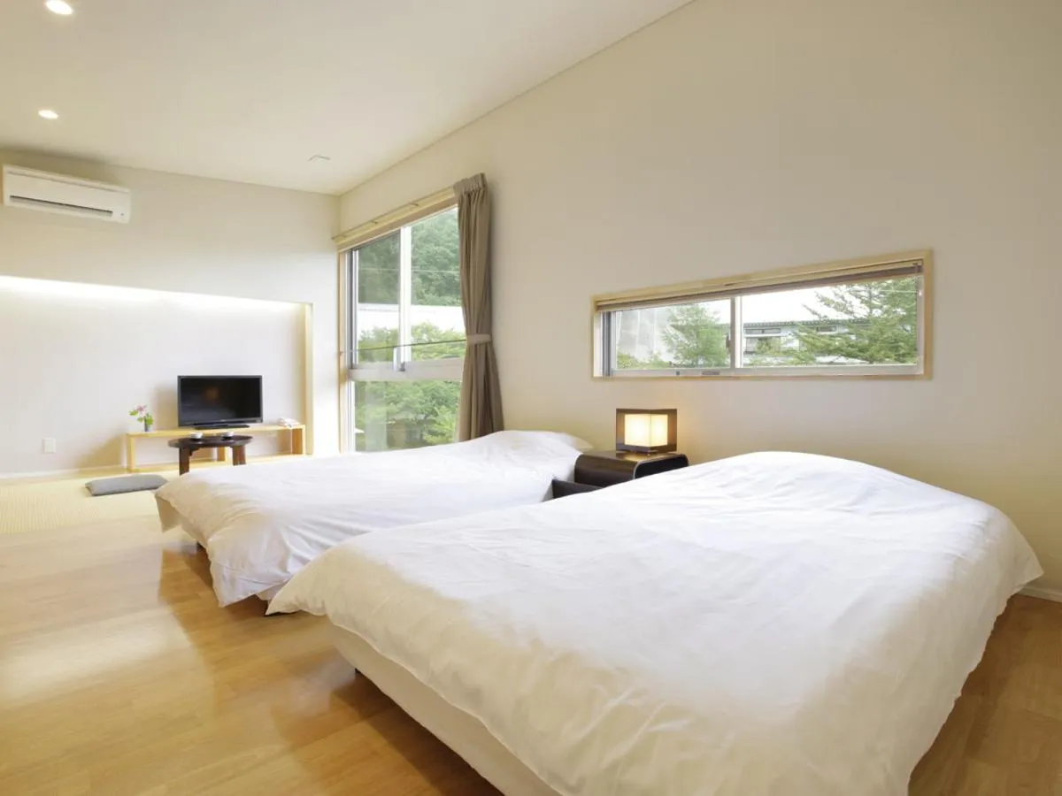 Bed in Kusatsu Hotel Bekkan Wata no Yu (Adult Only)