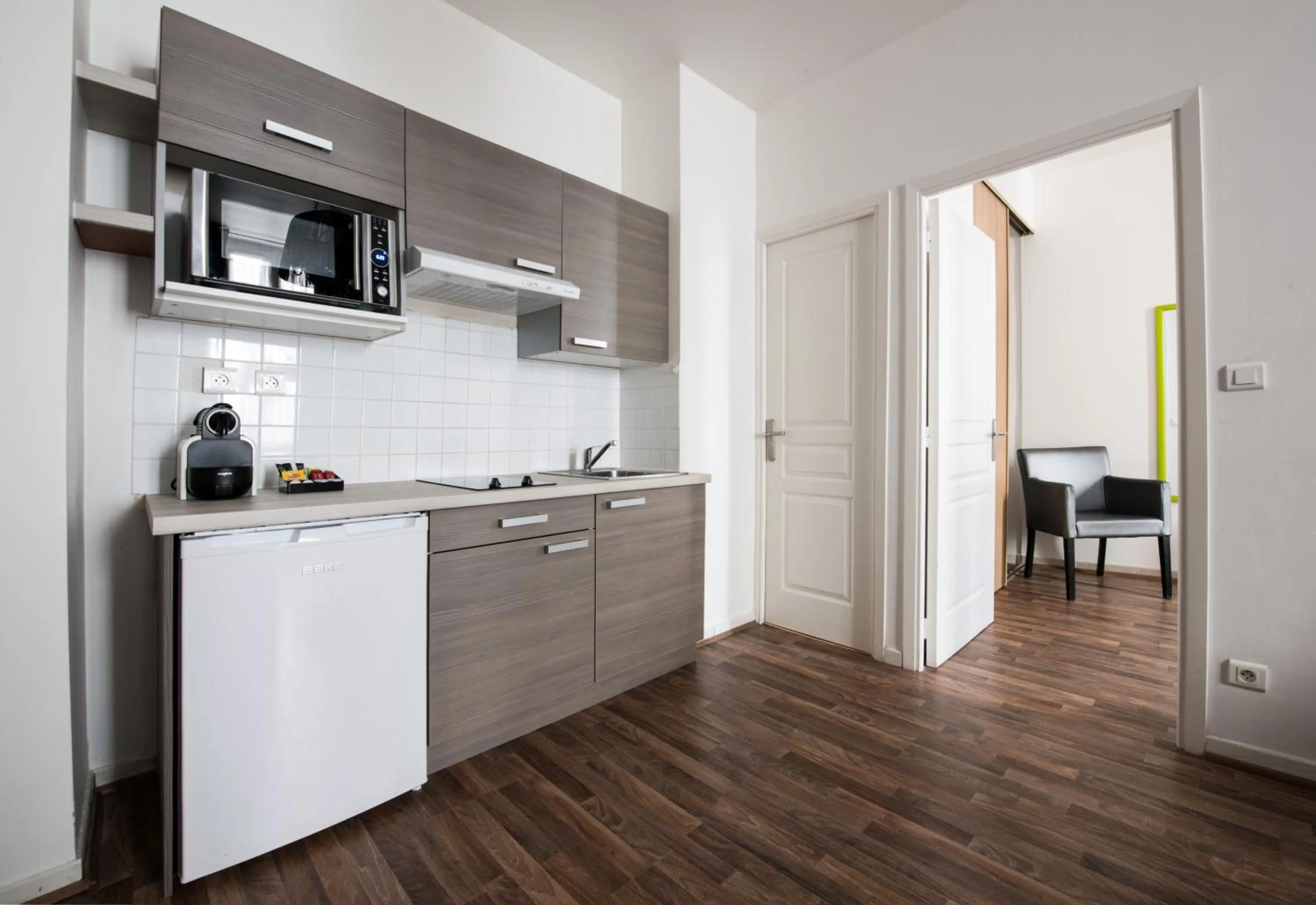 Kitchen or kitchenette in Florella Marceau Apartment
