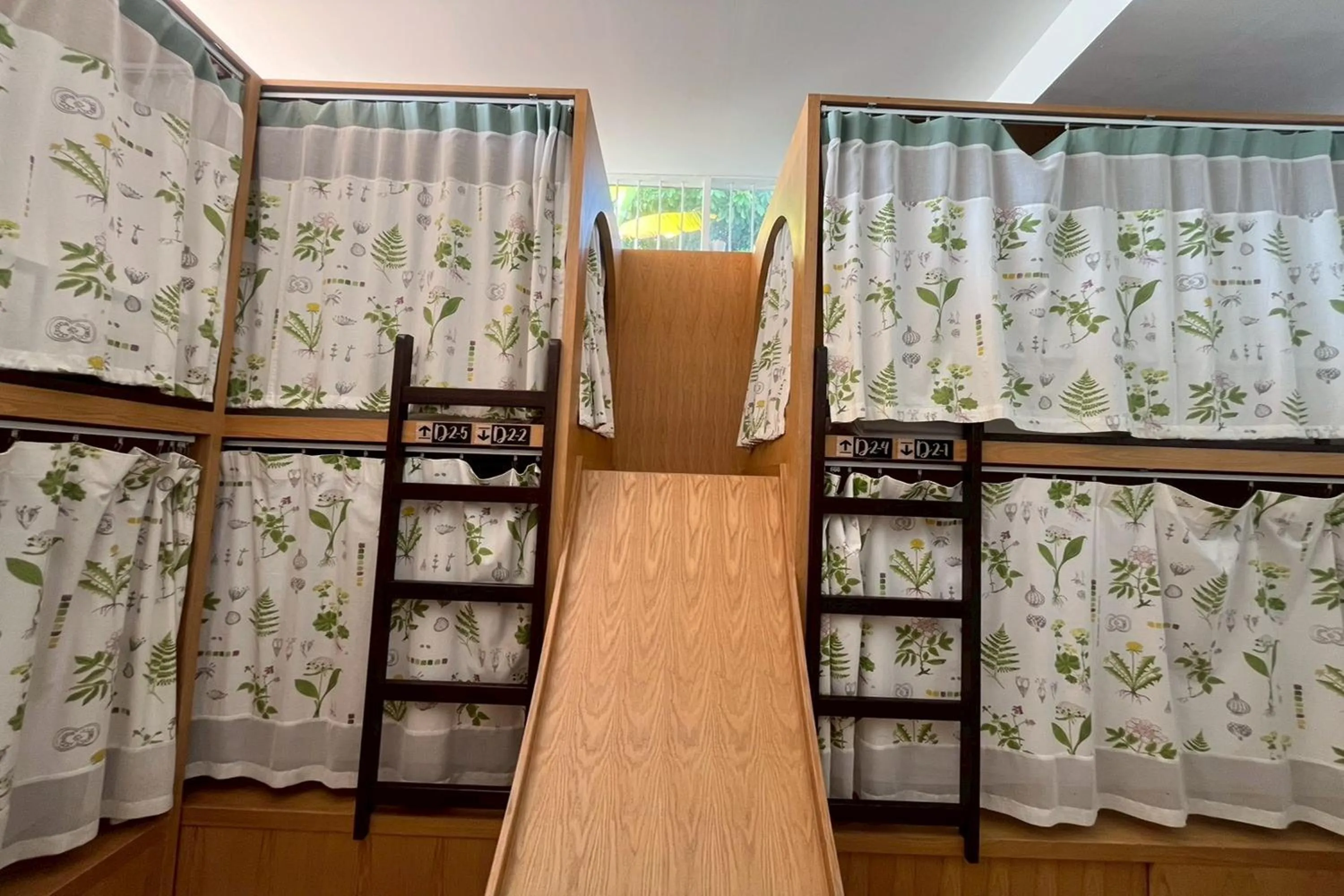 Bedroom in Memmoth Cafe & Hostel in Lampang