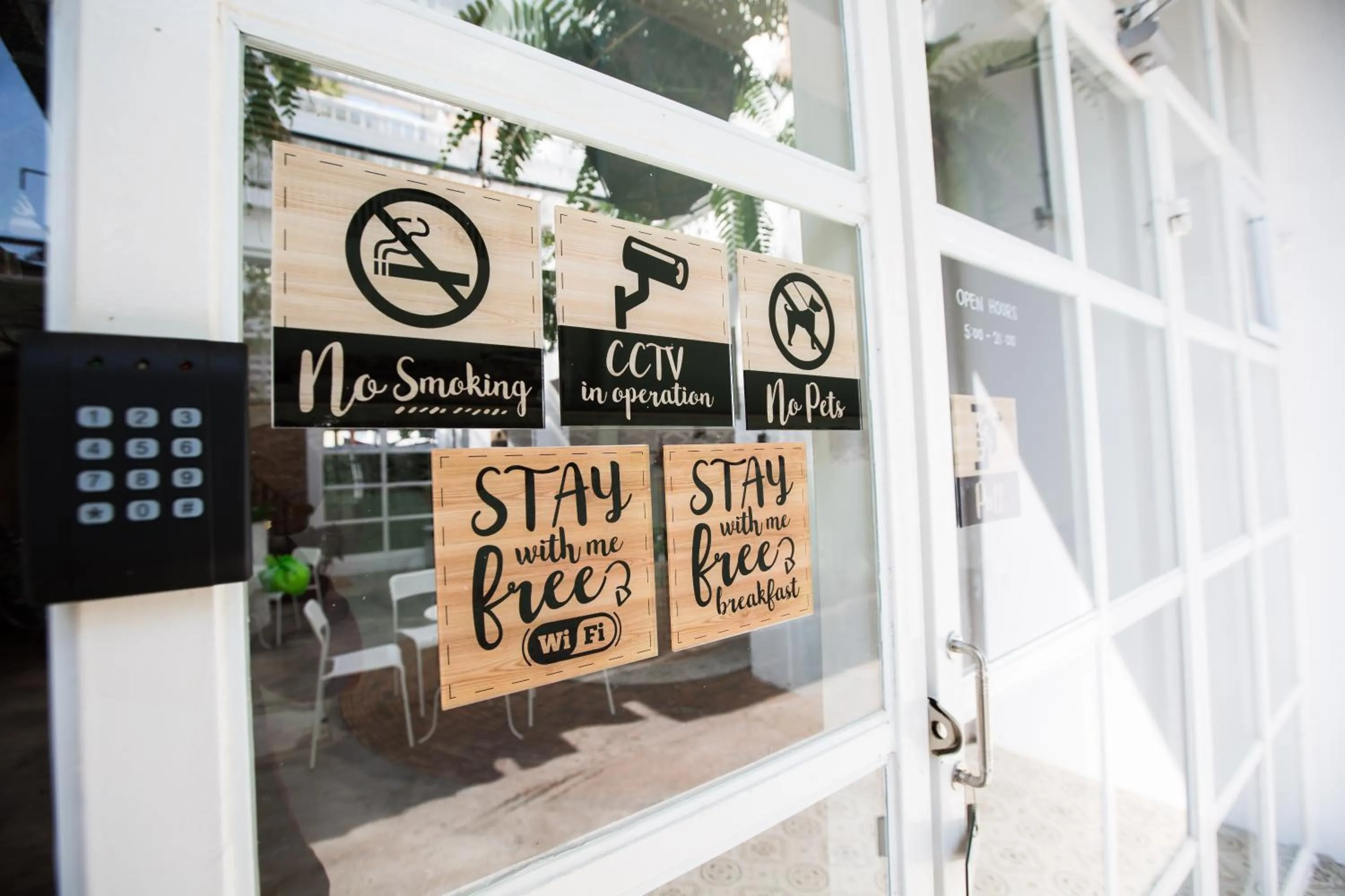 Property logo or sign in Memmoth Hostel In Lampang