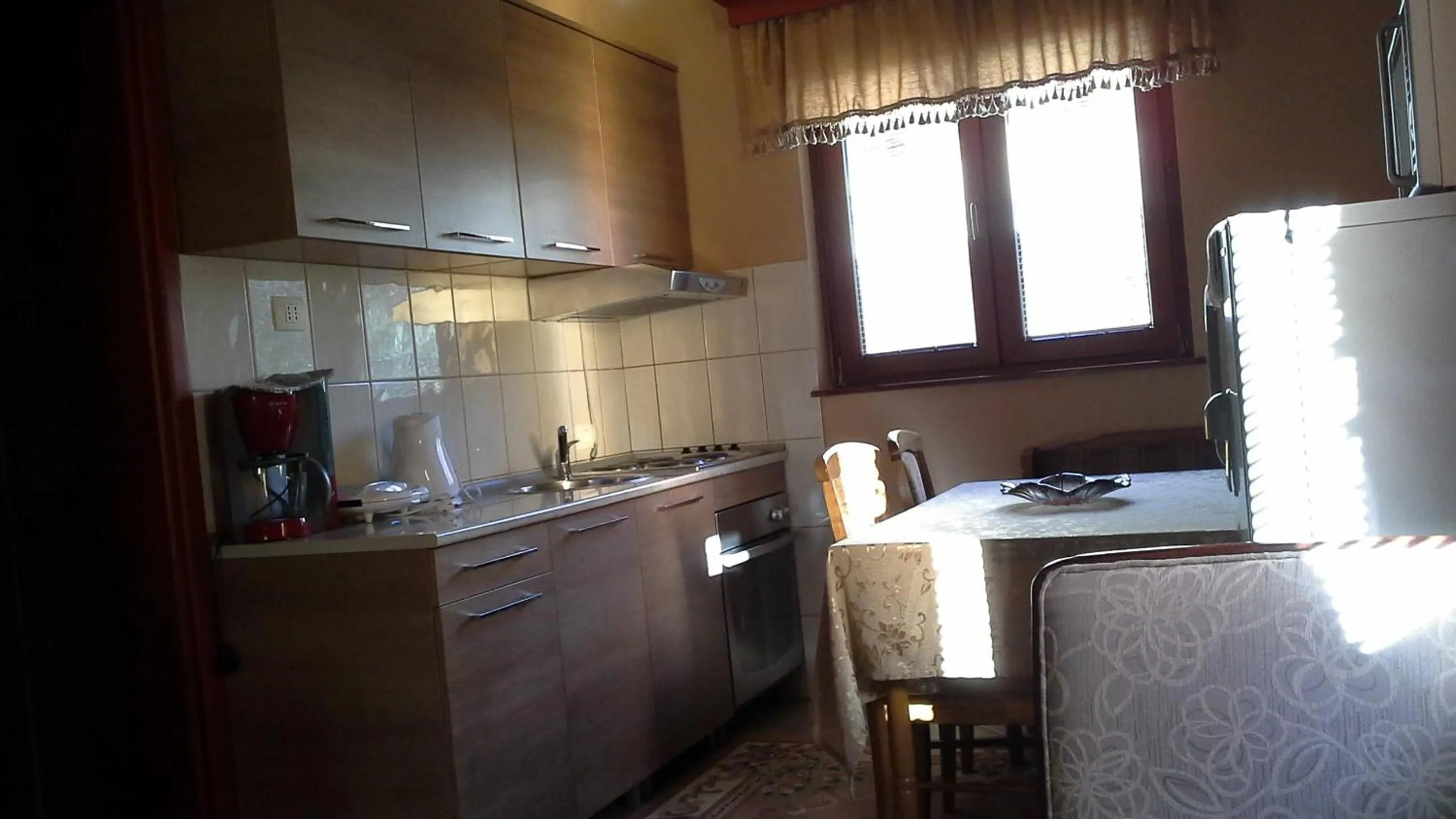 Kitchen or kitchenette in Apartments Bogdanovic
