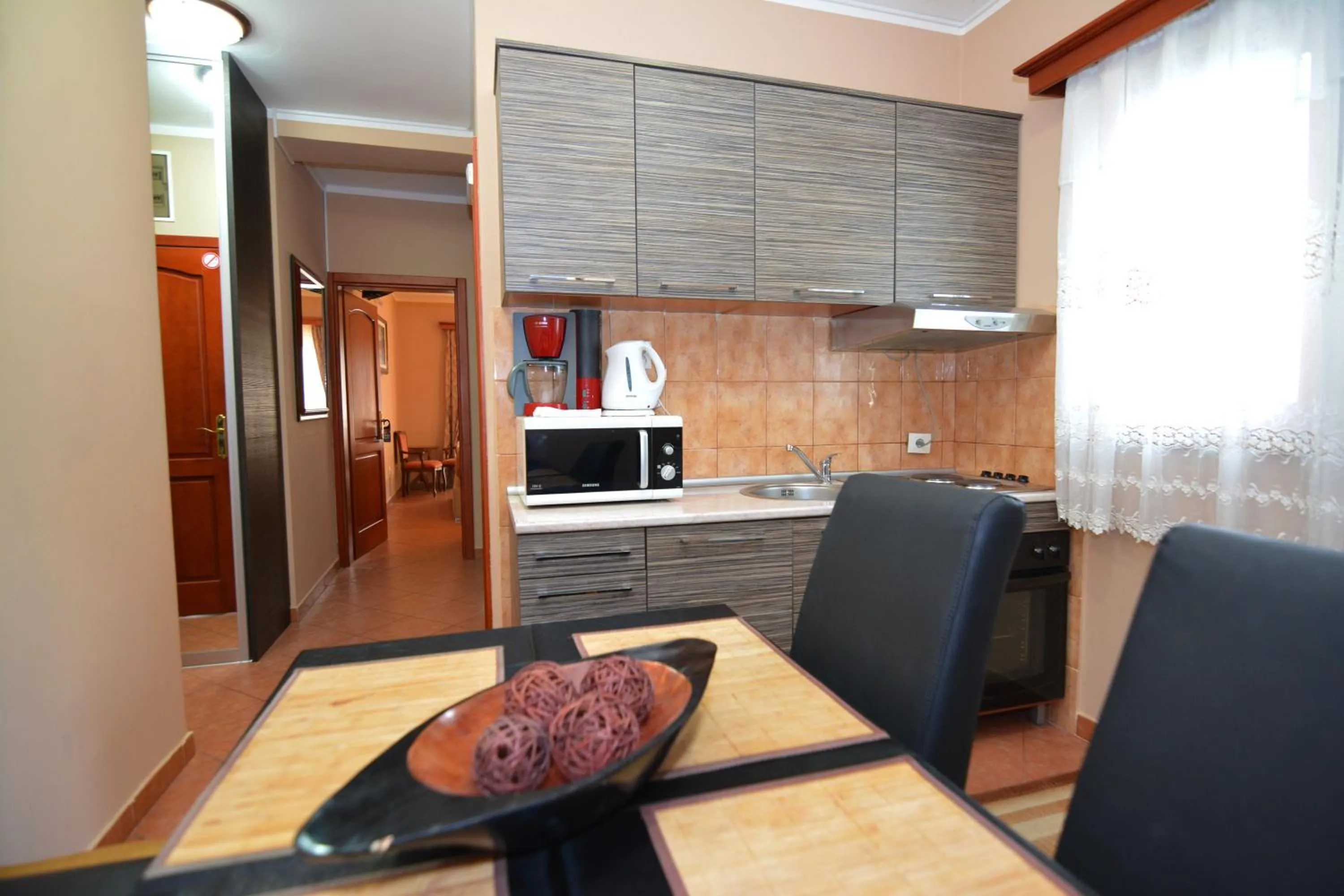 Kitchen or kitchenette in Apartments Bogdanovic