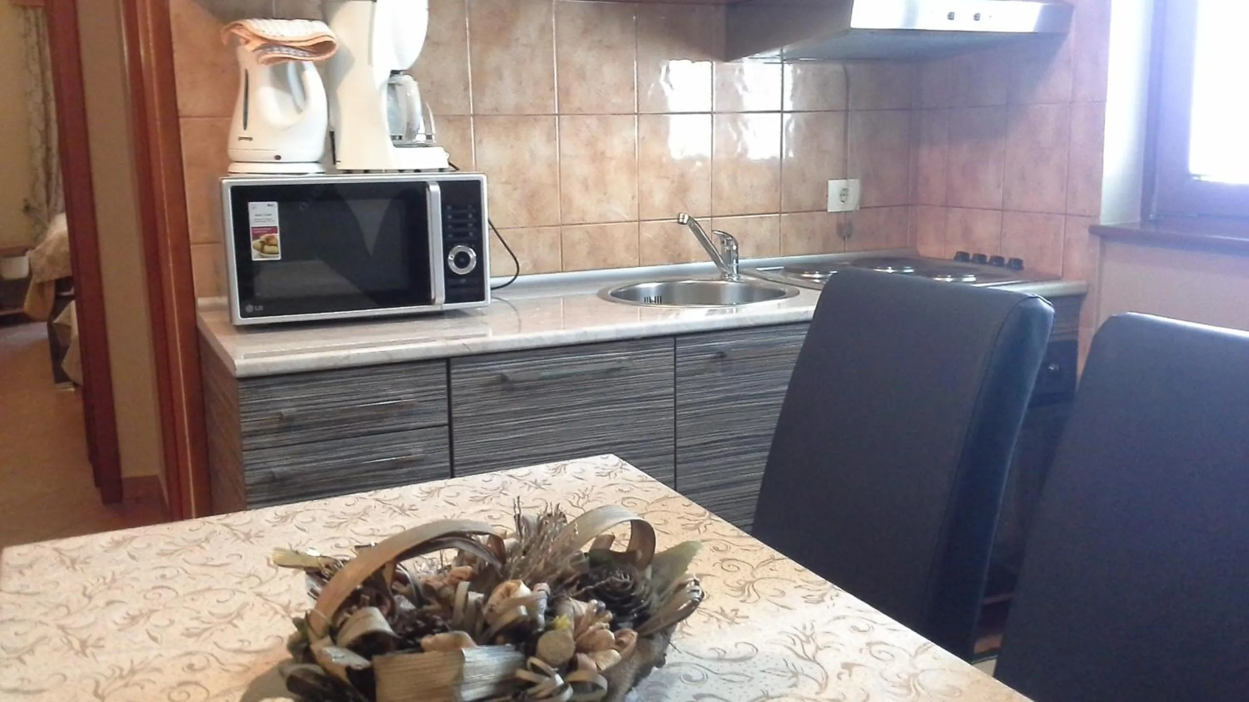 Kitchen or kitchenette in Apartments Bogdanovic