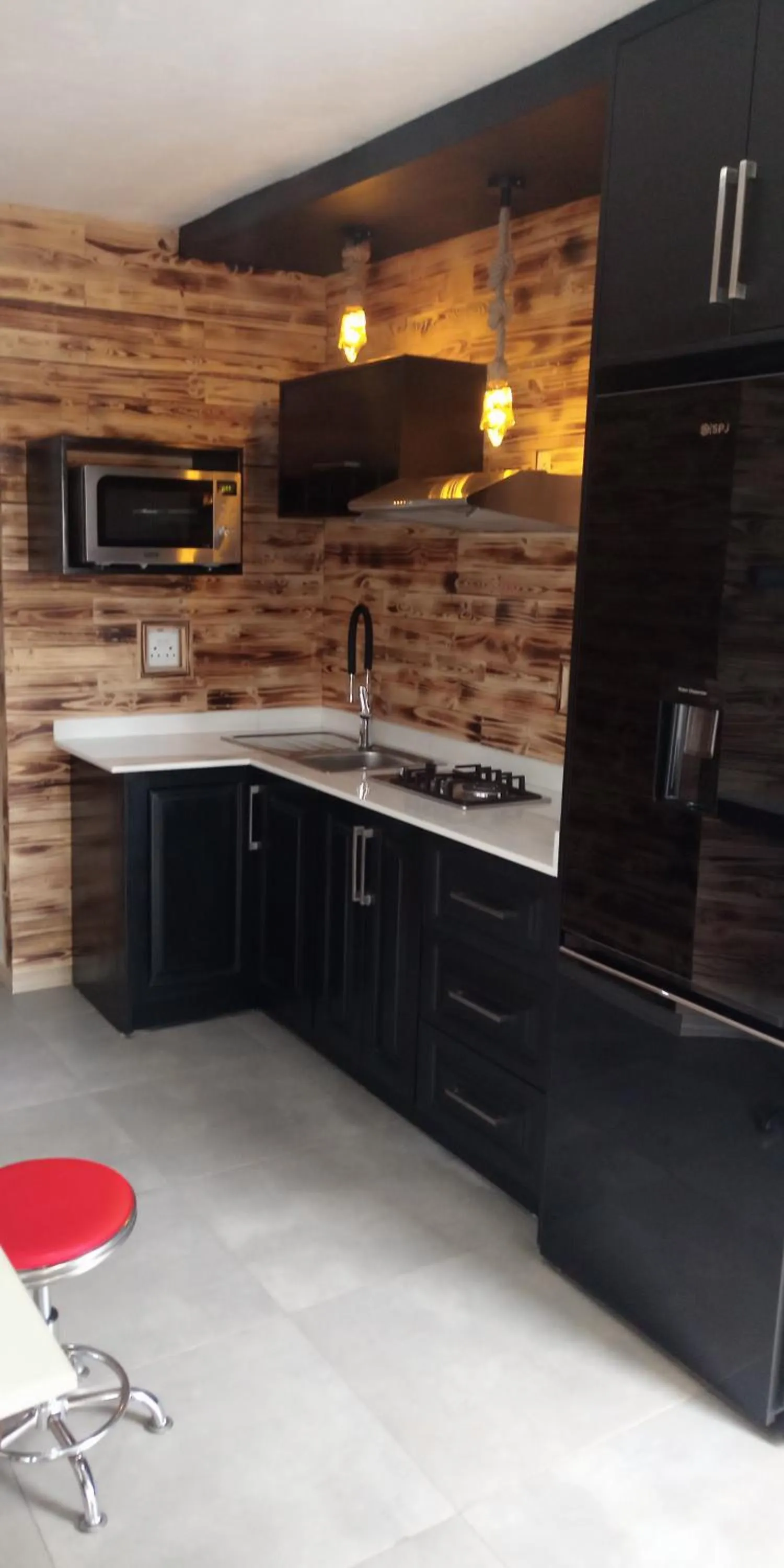 Kitchen or kitchenette in CommonLens Inn