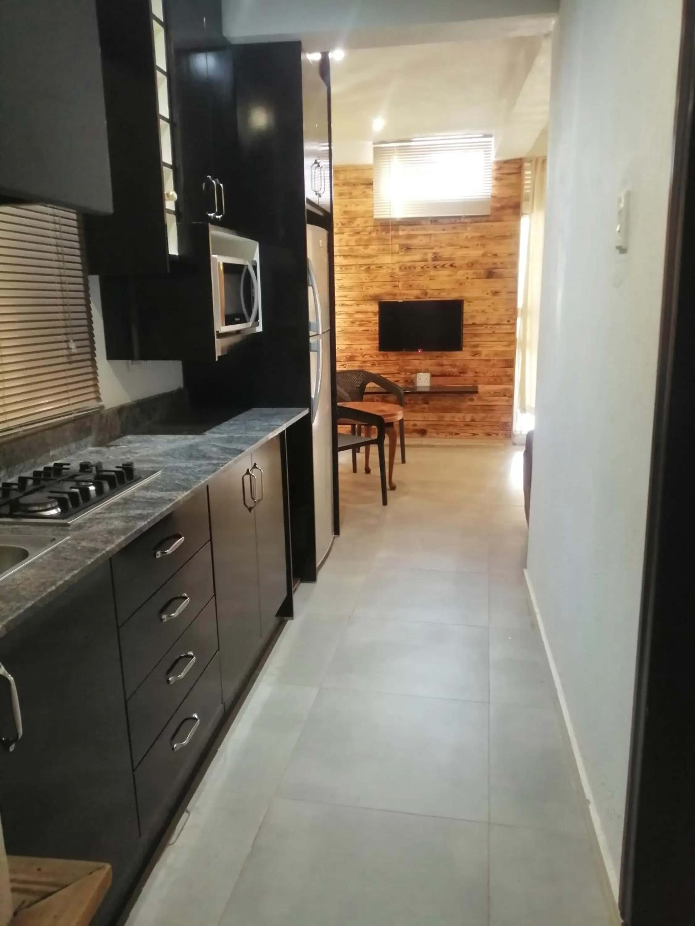 Kitchen or kitchenette in CommonLens Inn