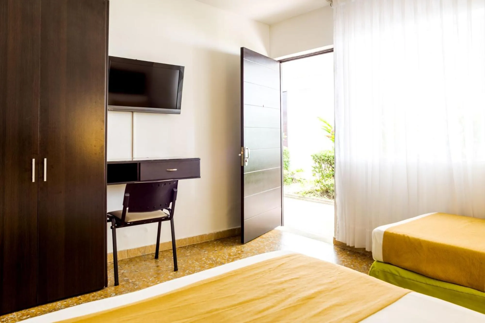 TV and multimedia, Bed in Hotel Manantial Melgar