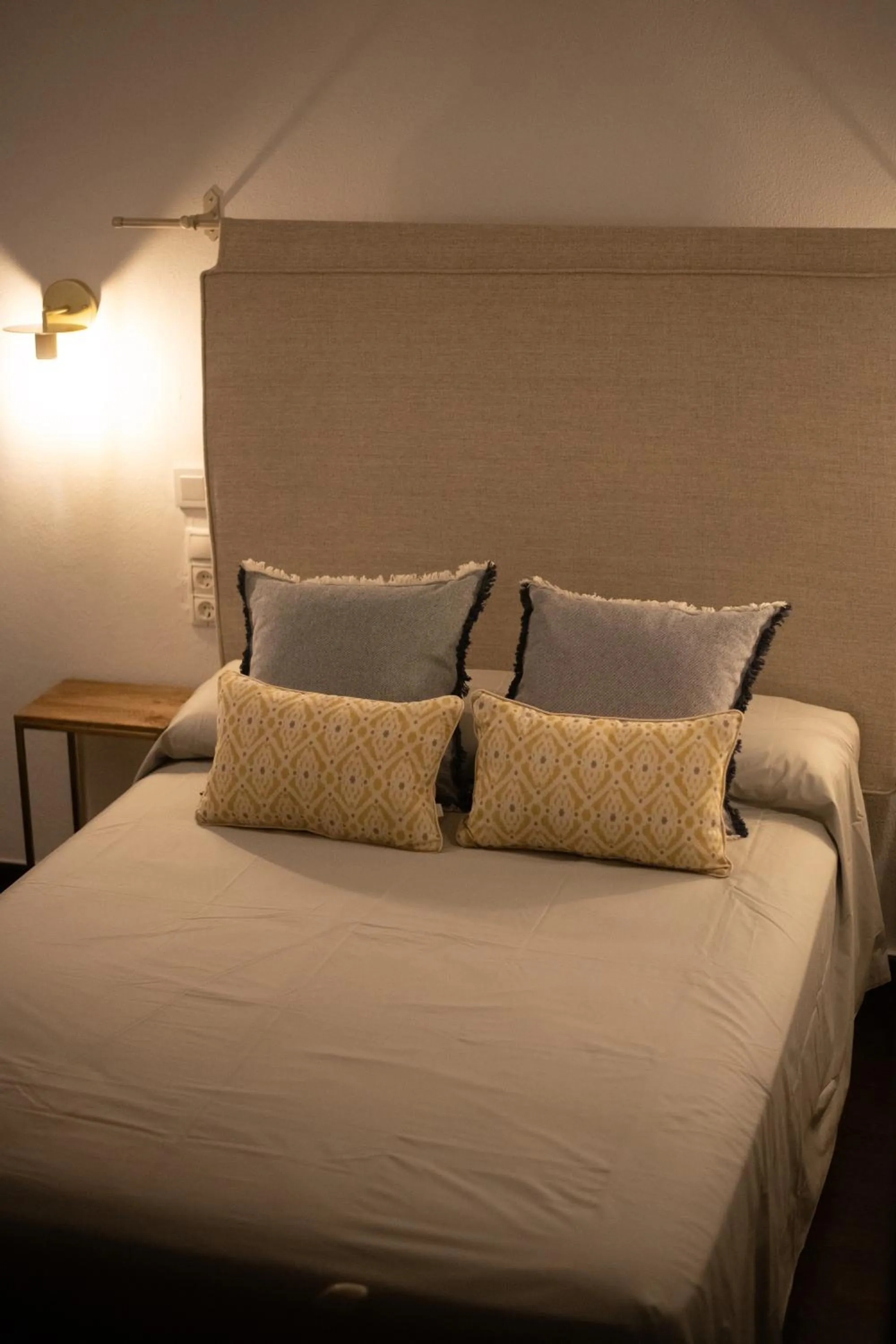 Bed in HOTEL BOUTIQUE ALMA ANDALUSí