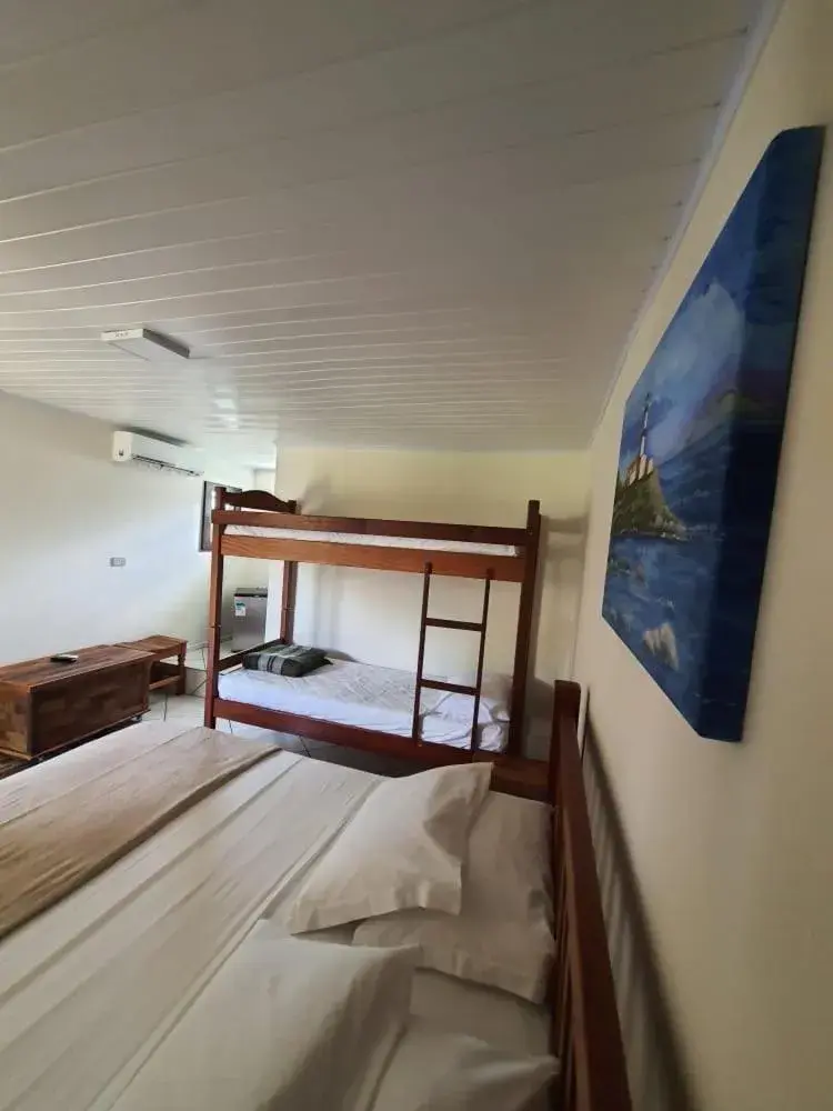 Economy Quadruple Room in Complexo de Pousadas Caraguatá Economy Quadruple Room in Complexo de Pousadas Caraguatá