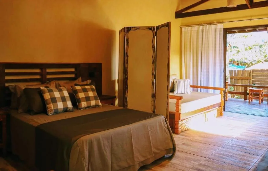 Bed in Complexo de Pousadas Caraguatá