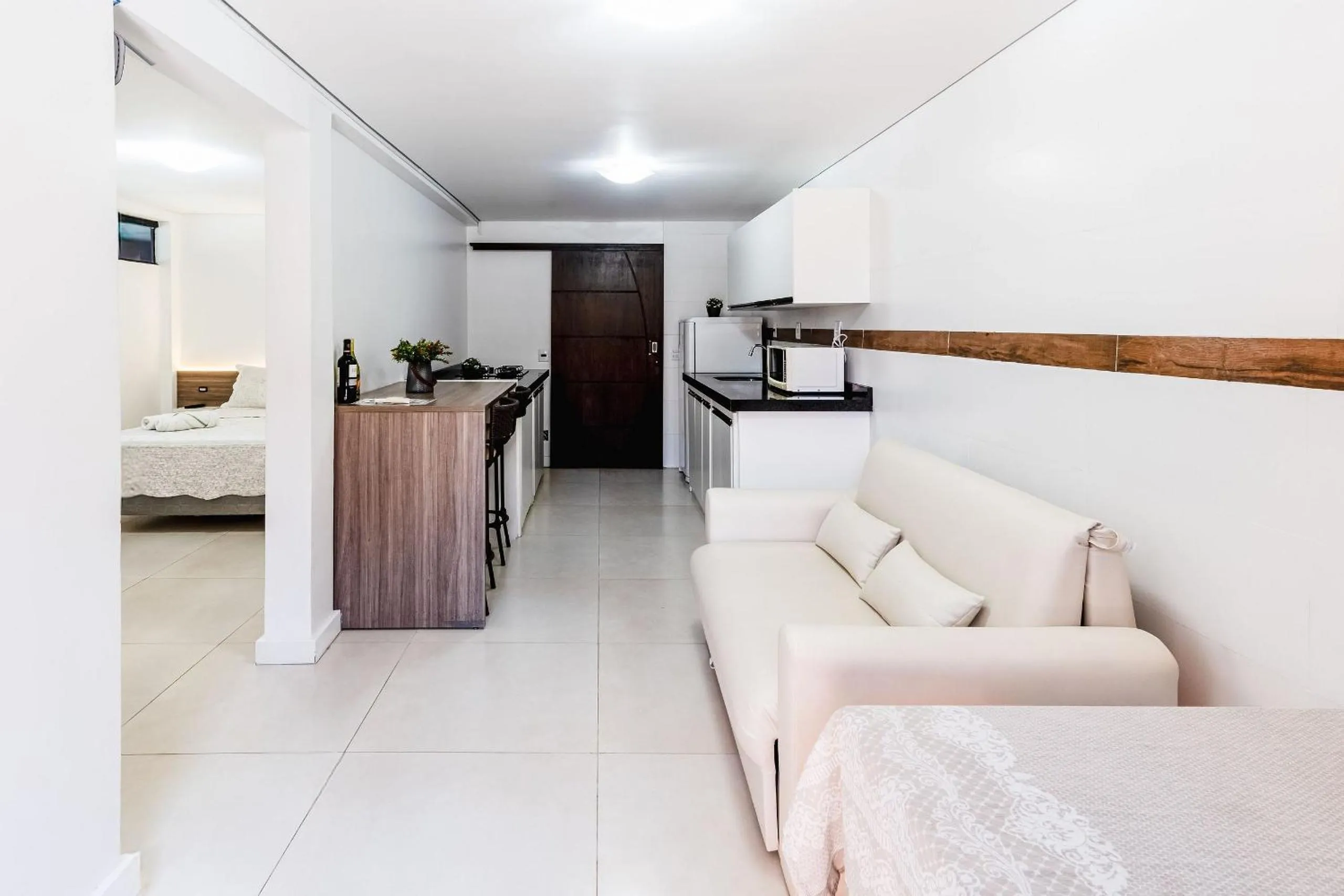 Living room, Bed in Pousada Solar dos Lírios - Praia do Rosa