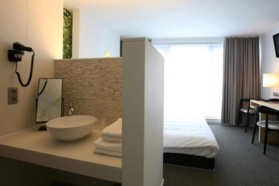 Bed in Hotel De Groene Hendrickx