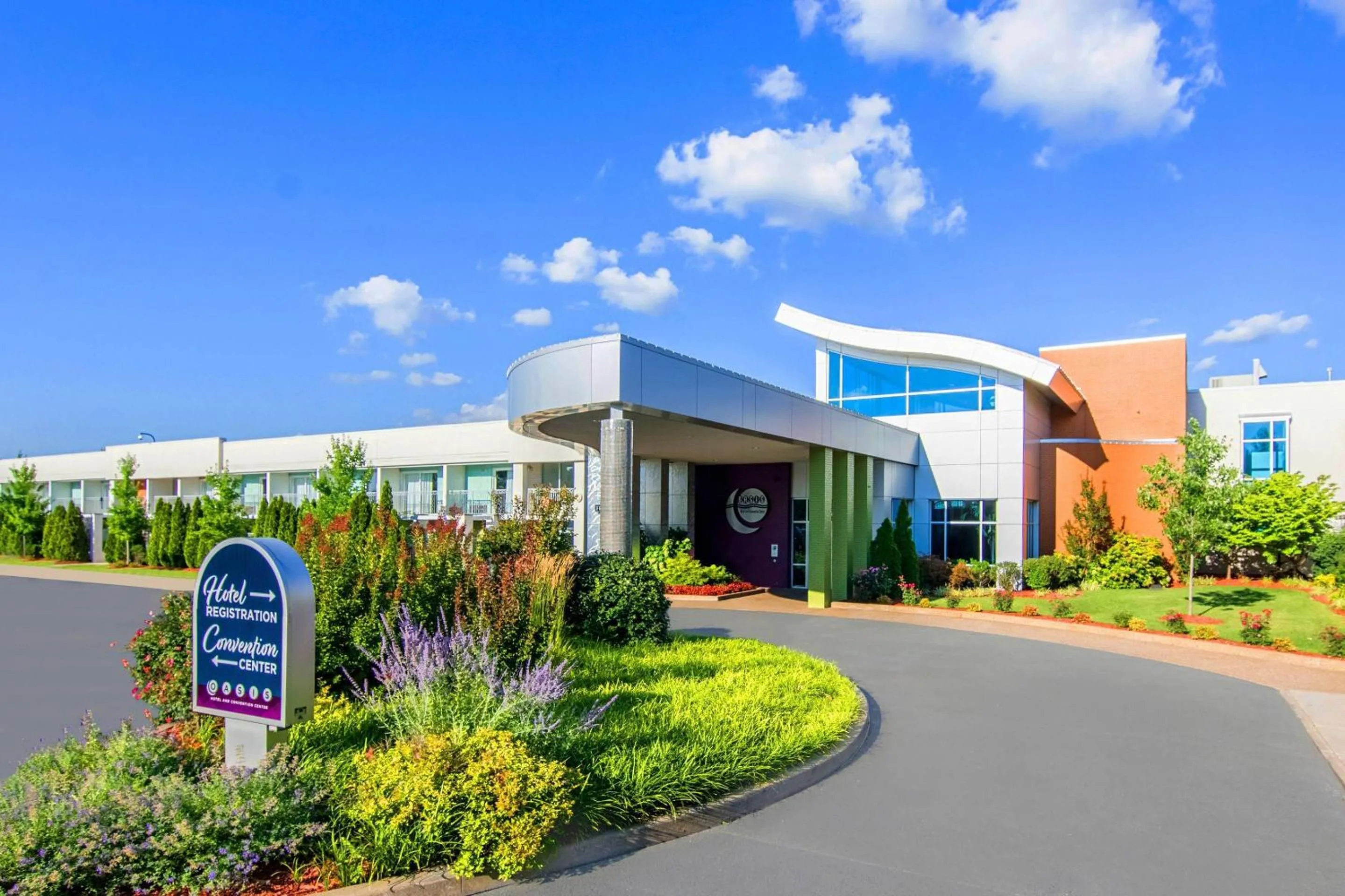 Property building in Oasis Hotel and Conv Center, an Ascend Collection Hotel
