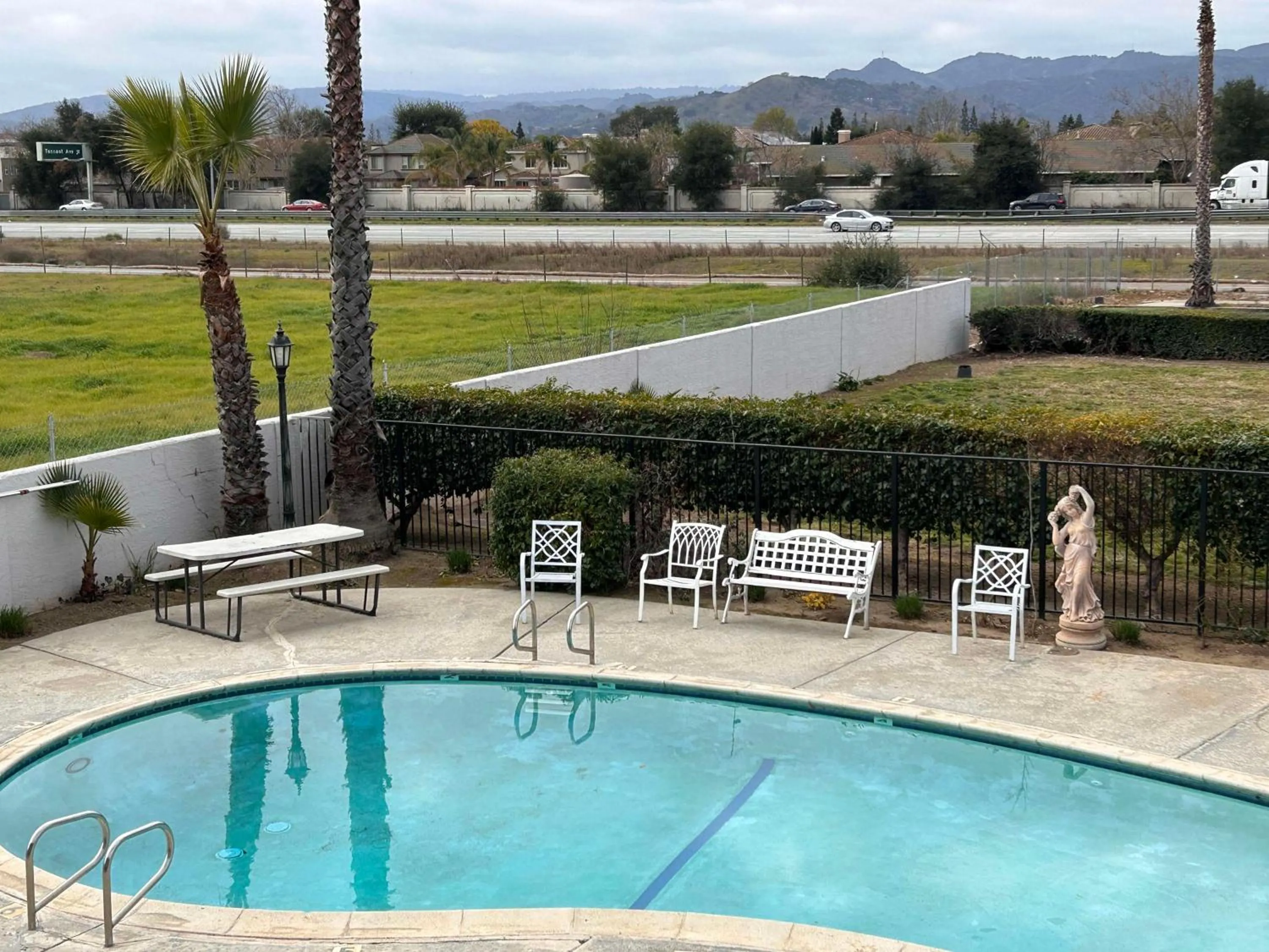Pool view in SureStay by Best Western Morgan Hill