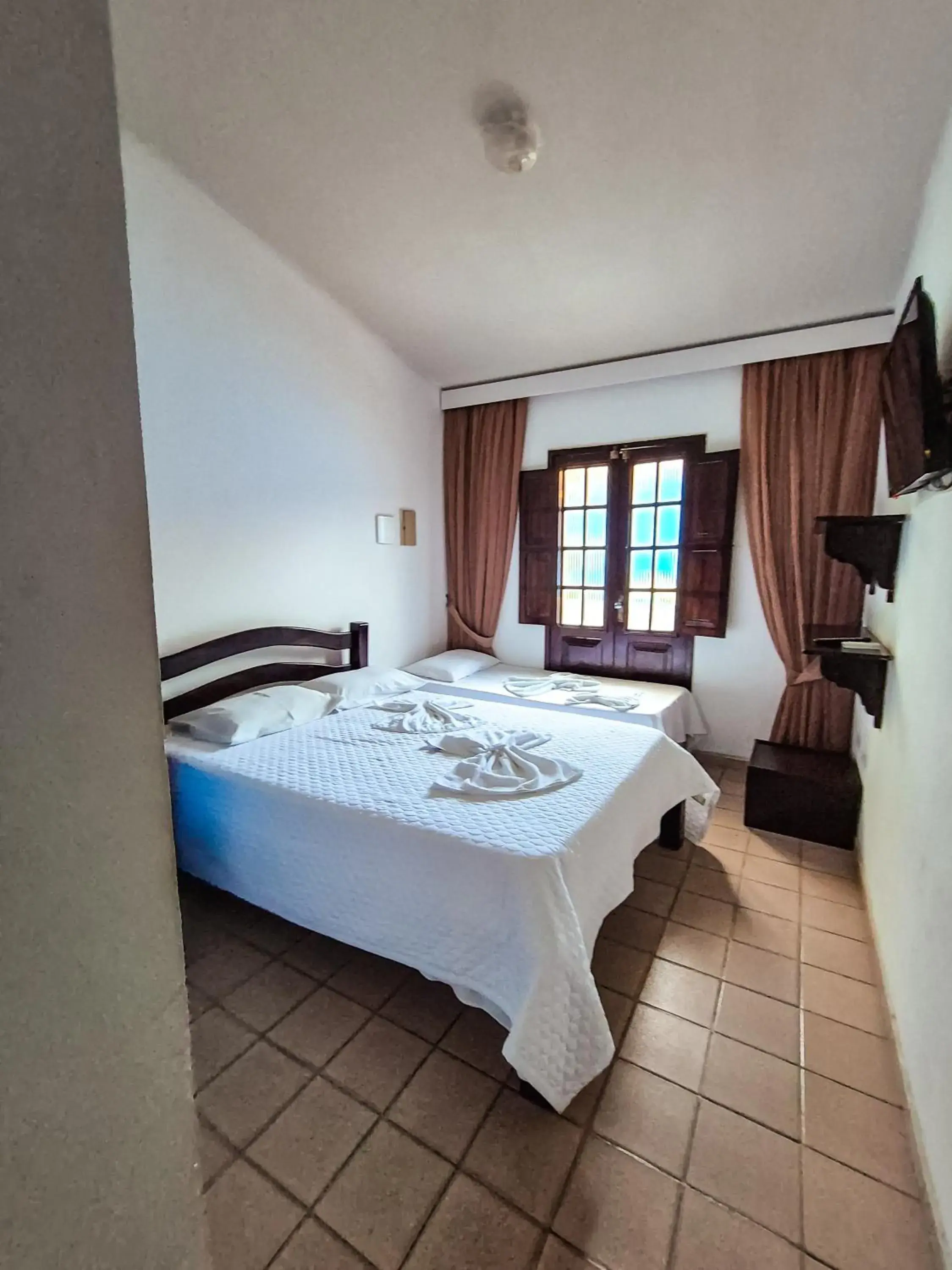 Standard Triple Room in Pousada Morada Azul Standard Triple Room in Pousada Morada Azul