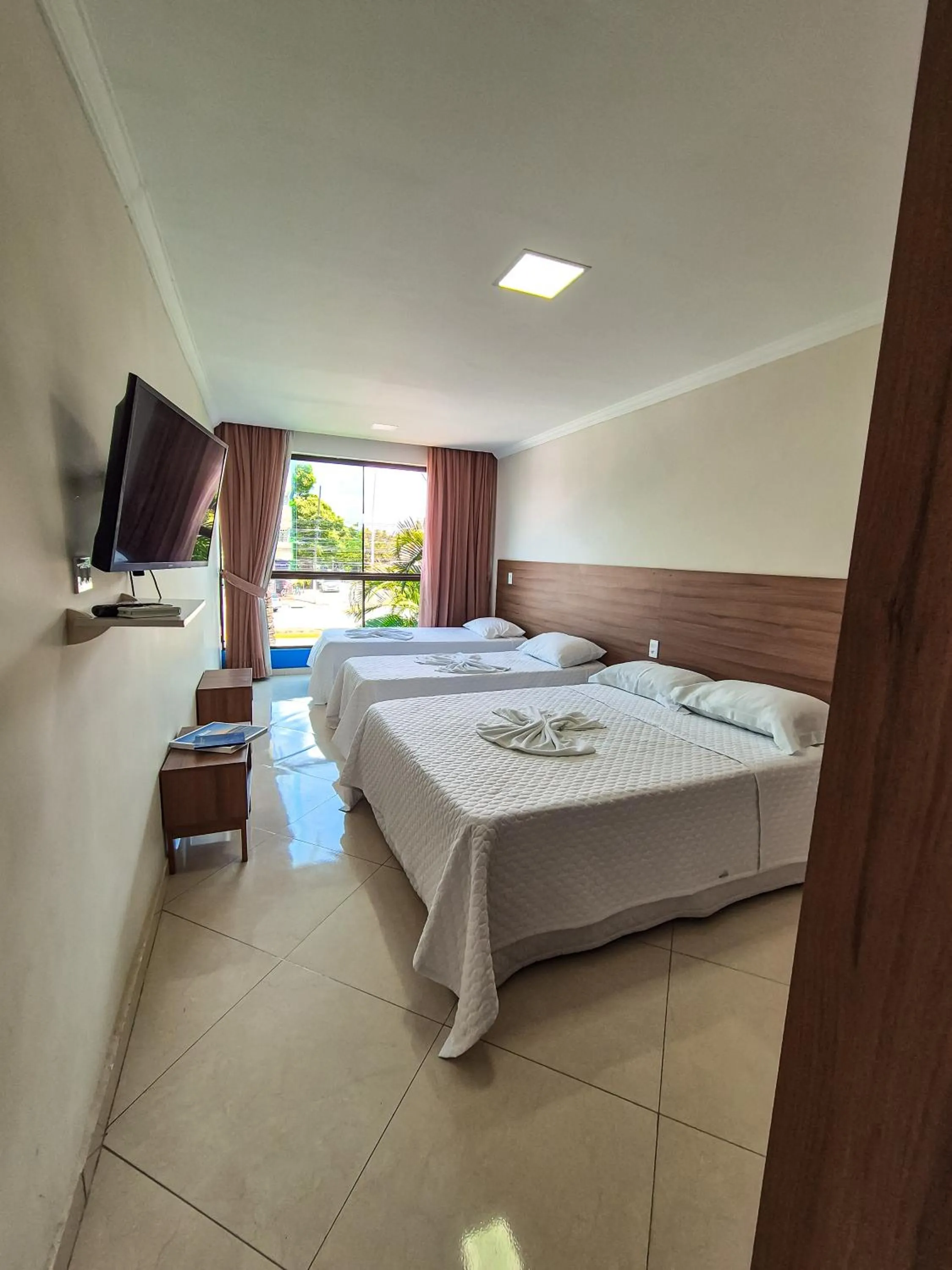 Photo of the whole room, Bed in Pousada Morada Azul