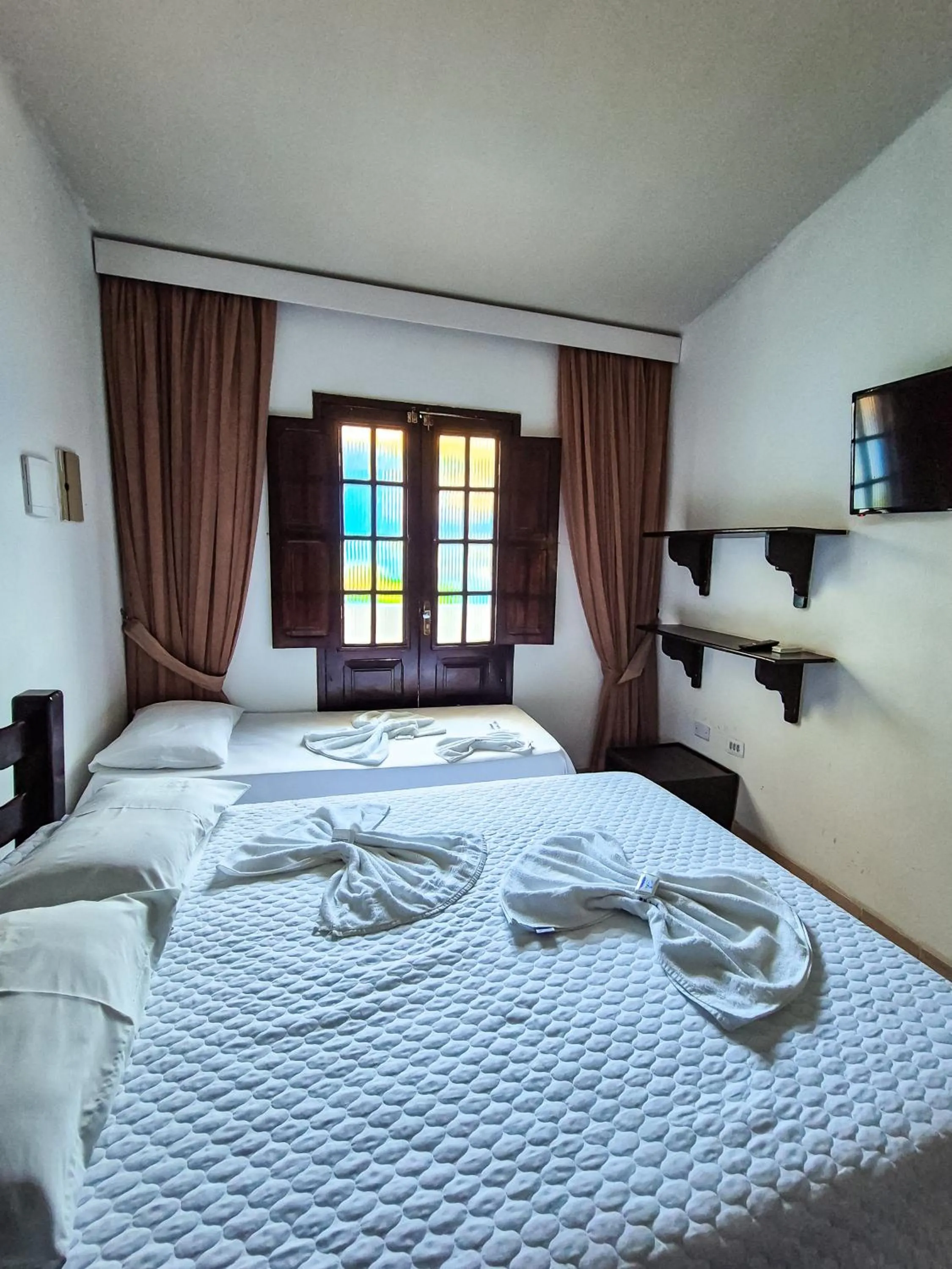 Bed in Pousada Morada Azul