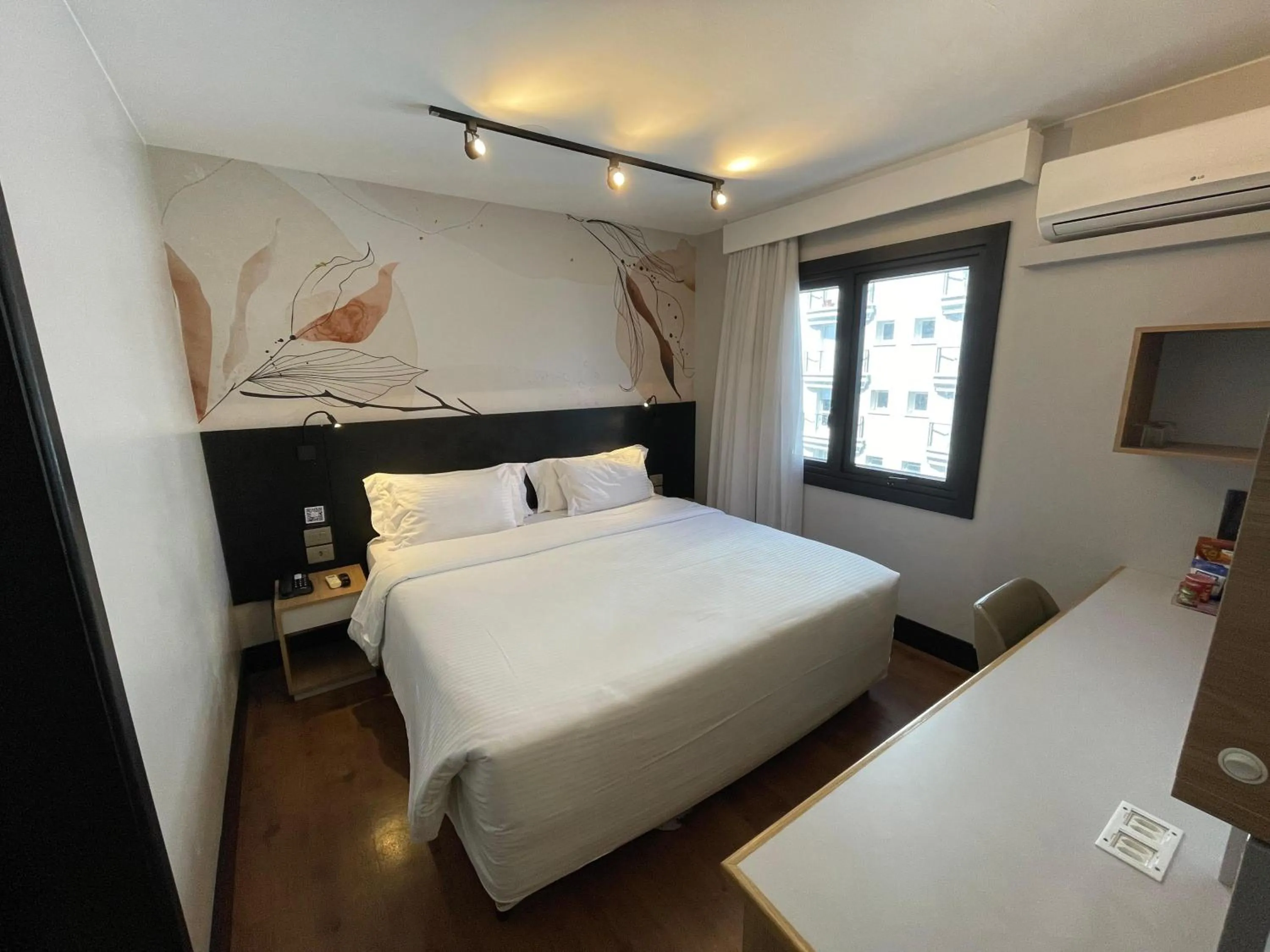 Bed in ArtHotel Transamerica Collection