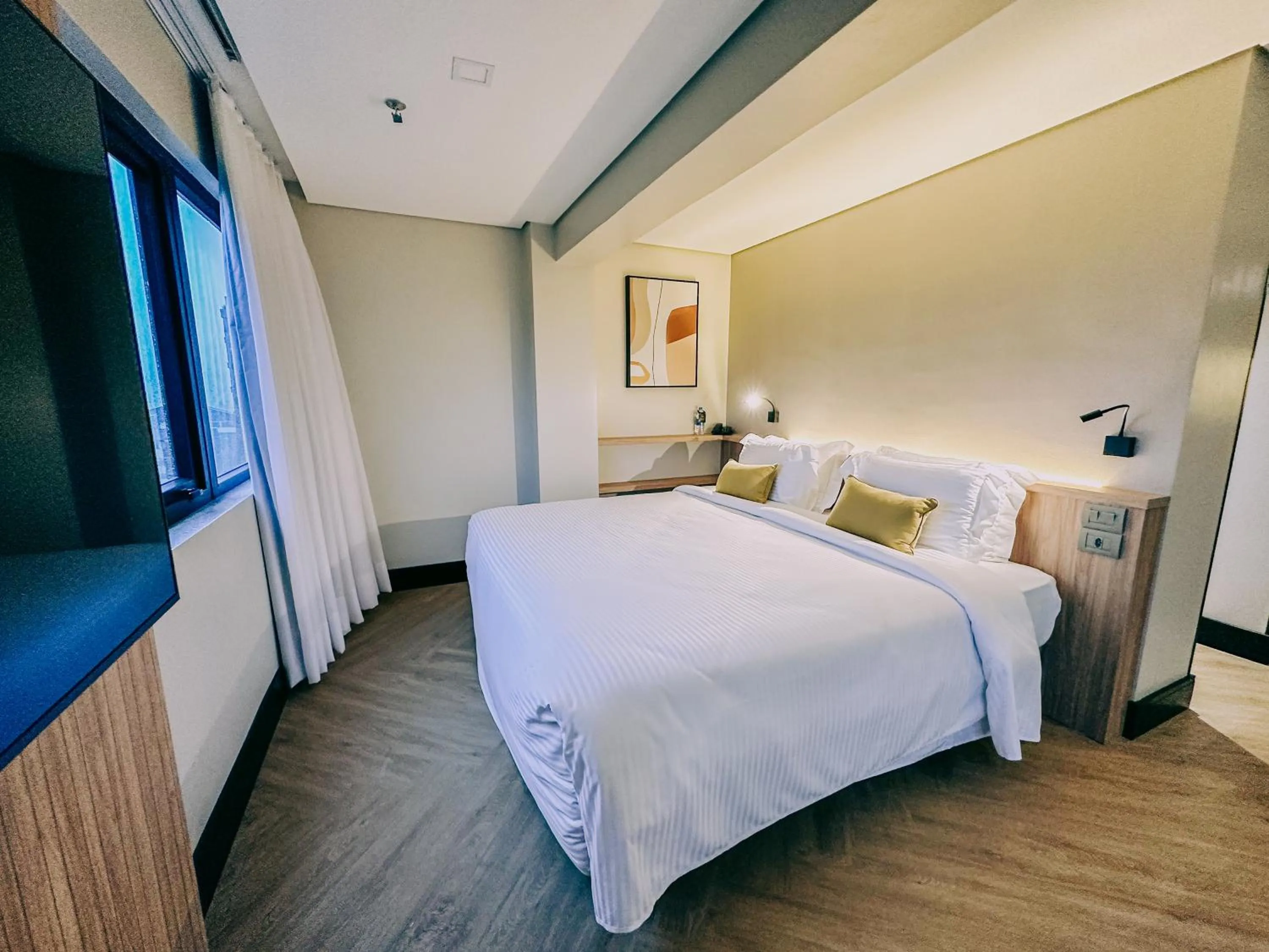 Bed in ArtHotel Transamerica Collection