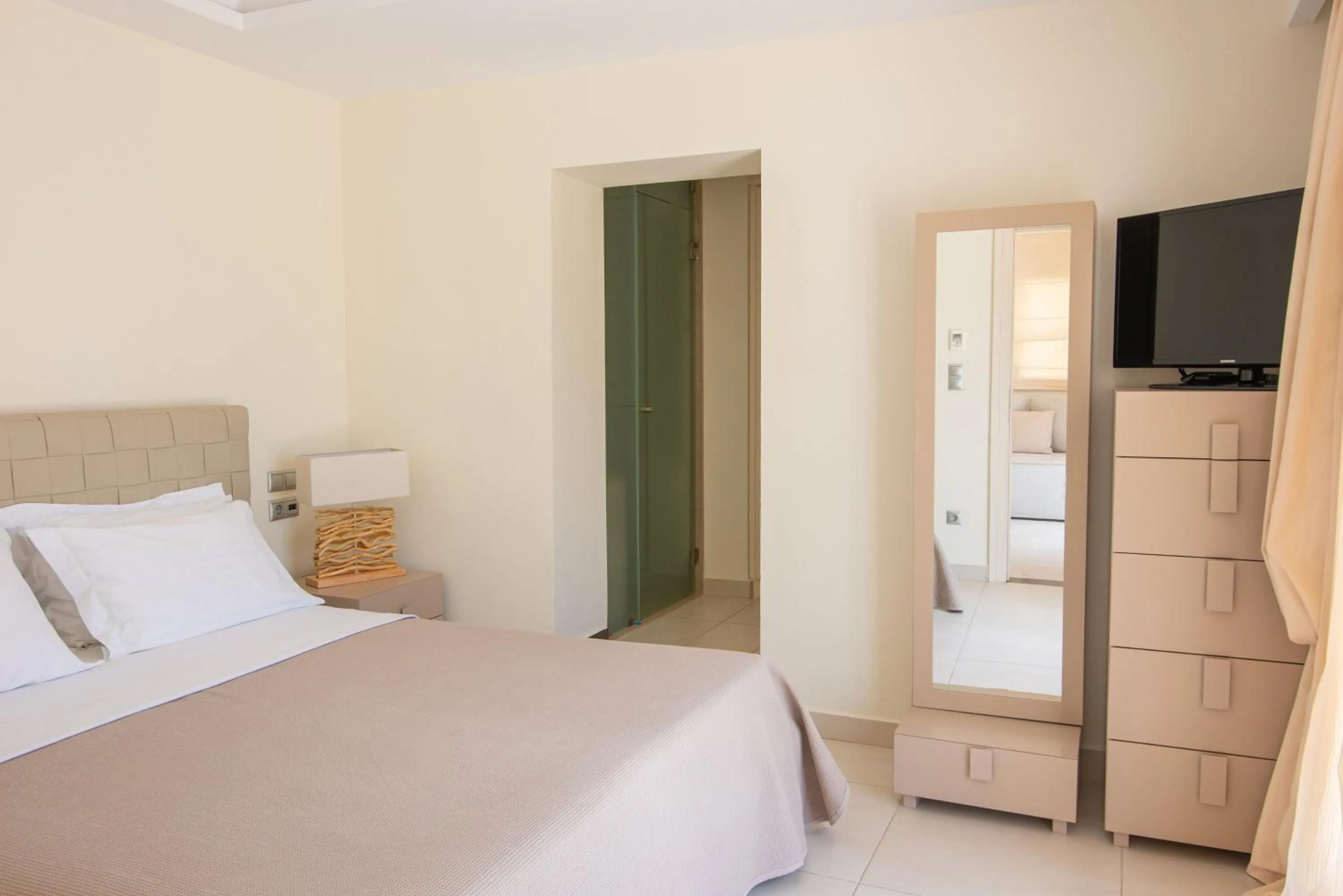Bed in Almiriki Chios Rooms & Apartments