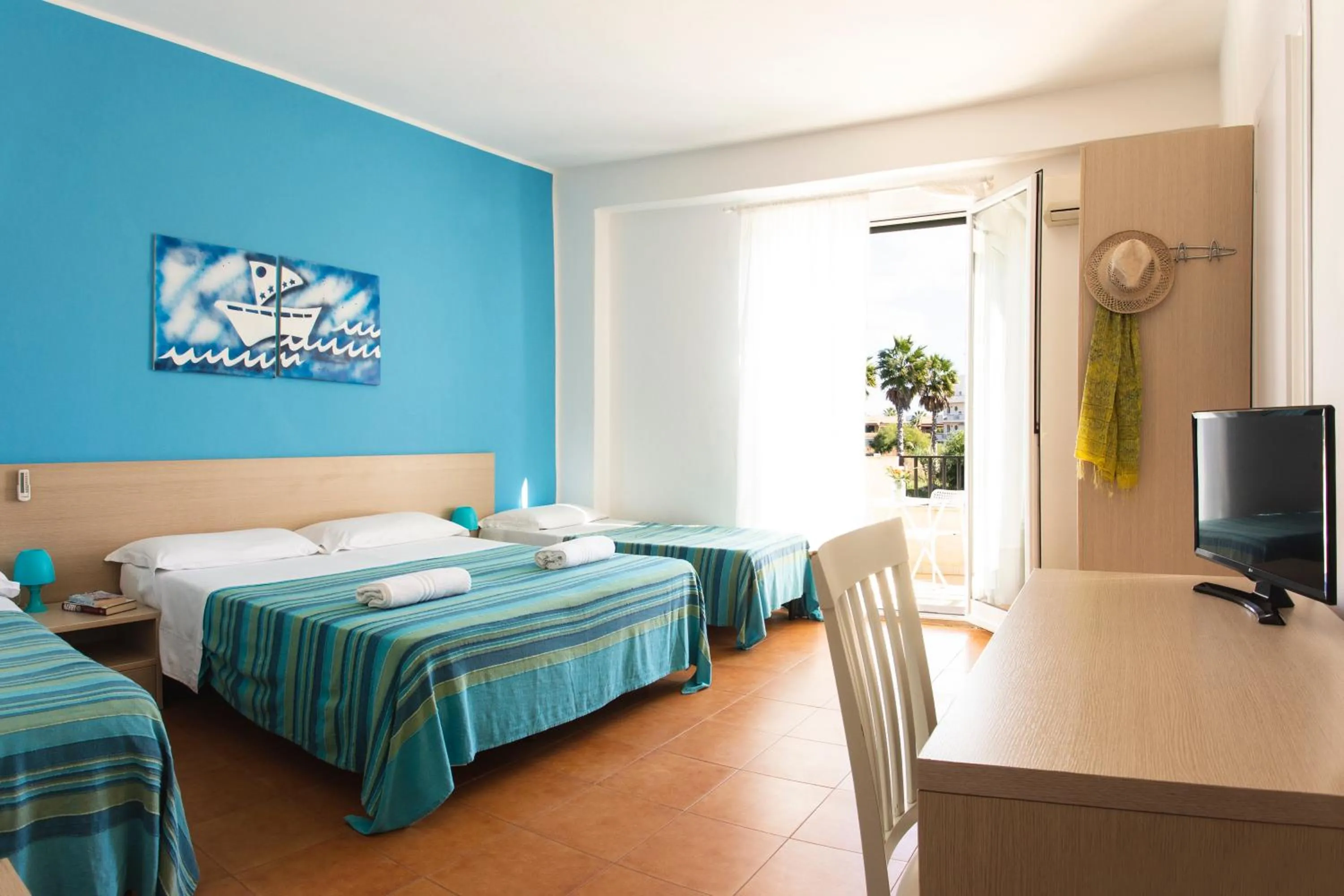 Bed in Hotel Baia Del Sole