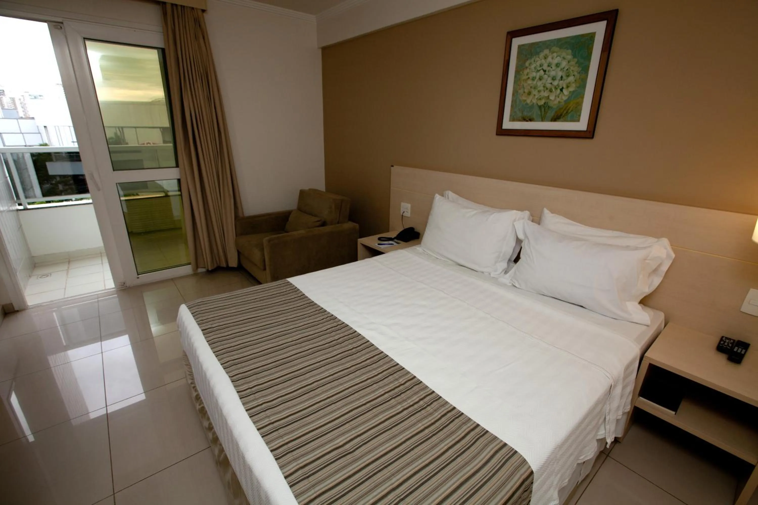 Balcony/Terrace, Bed in Oitis Hotel