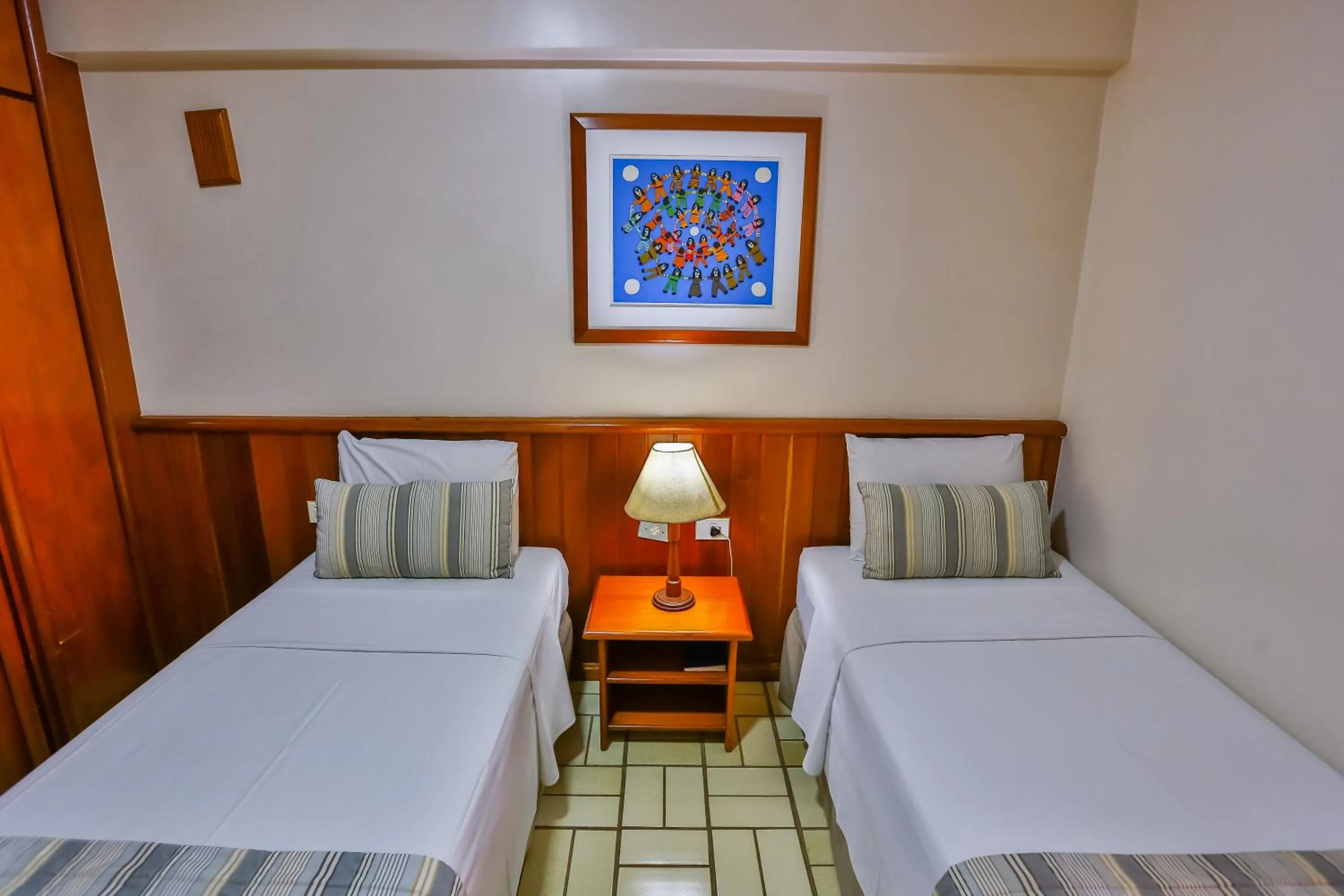 Bed in SAN MARINO SUITES HOTEL By NOBILE