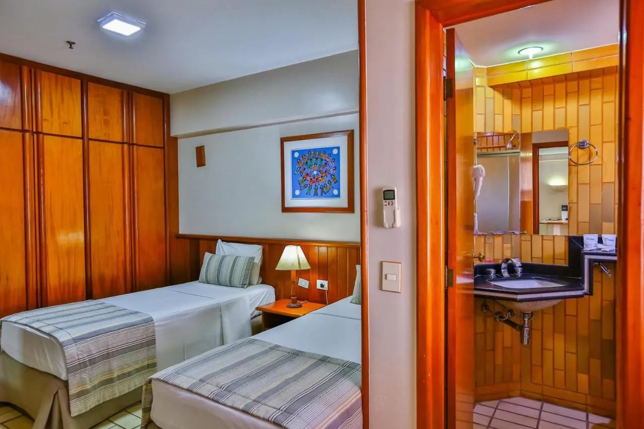 Bed in SAN MARINO SUITES HOTEL By NOBILE