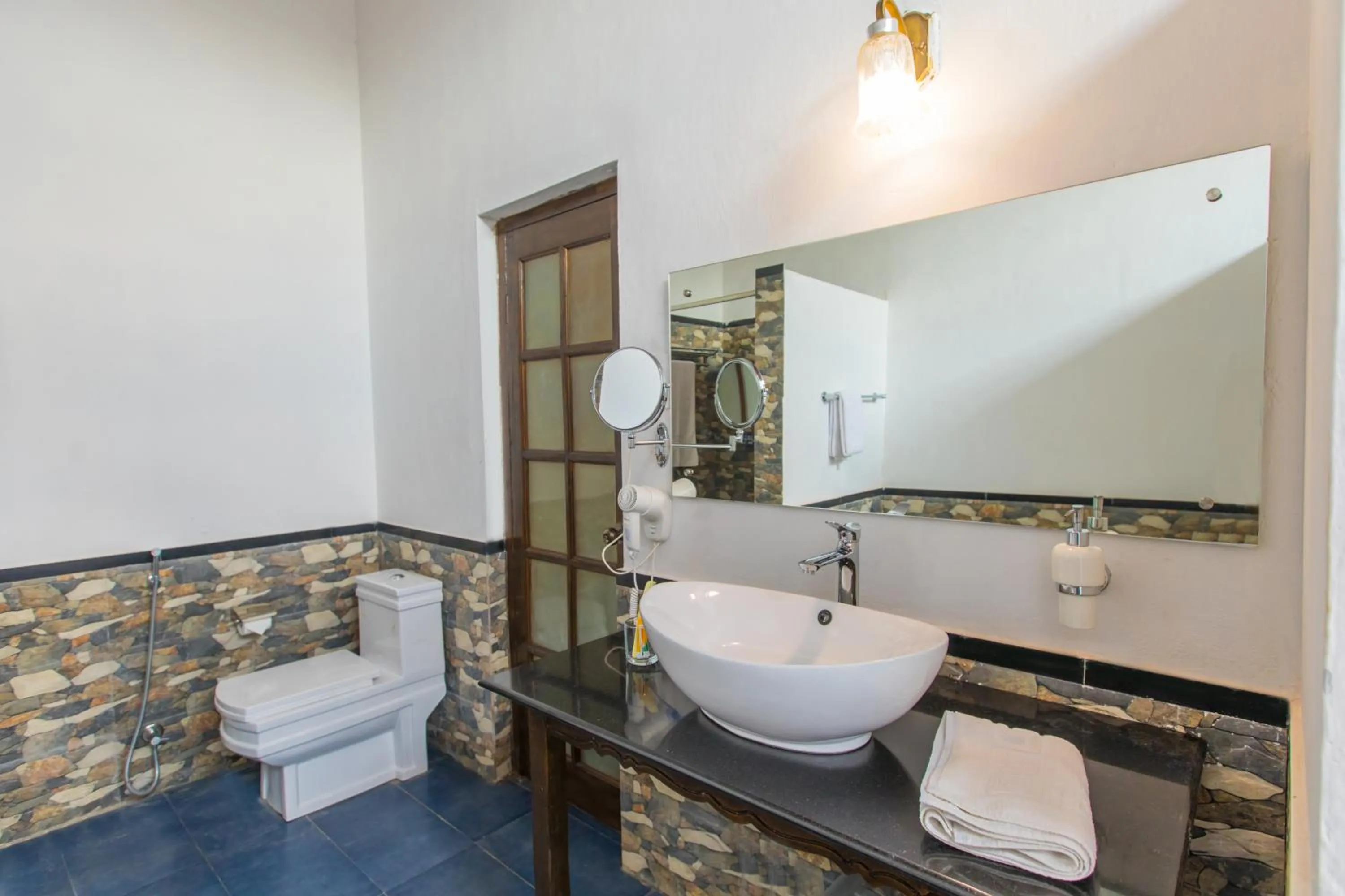 Bathroom in Tuli Veer Bagh Resort