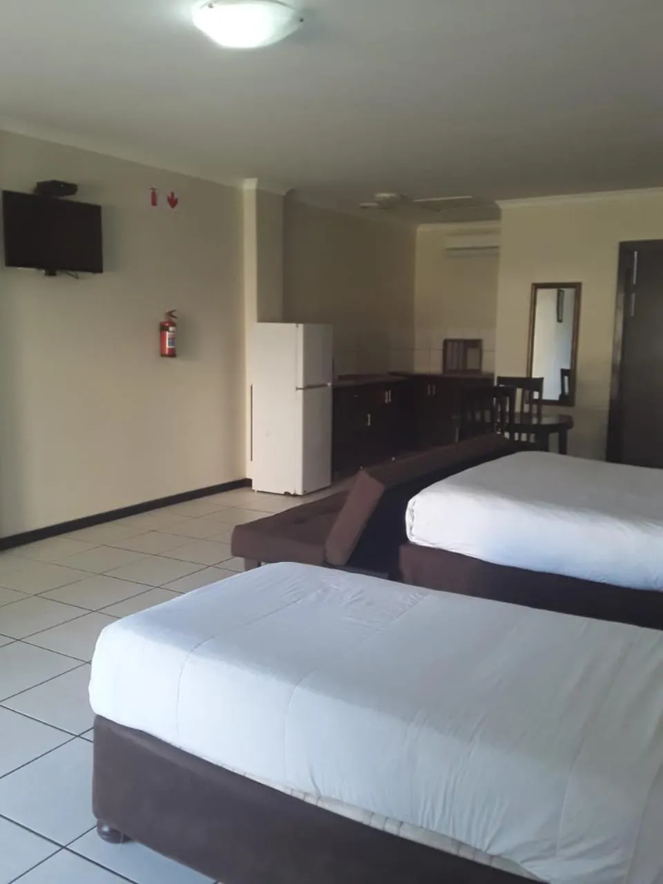Communal lounge/ TV room, Bed in Bayside Hotel Empangeni